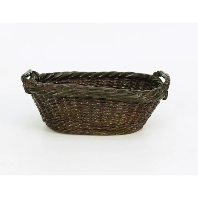 A bronze model of a miniature wicker basket, 13cm wide