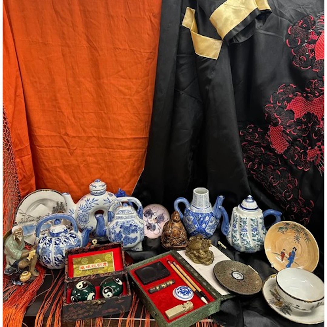 Five Chinese blue and white teapots, a Baoding Iron Ball set...