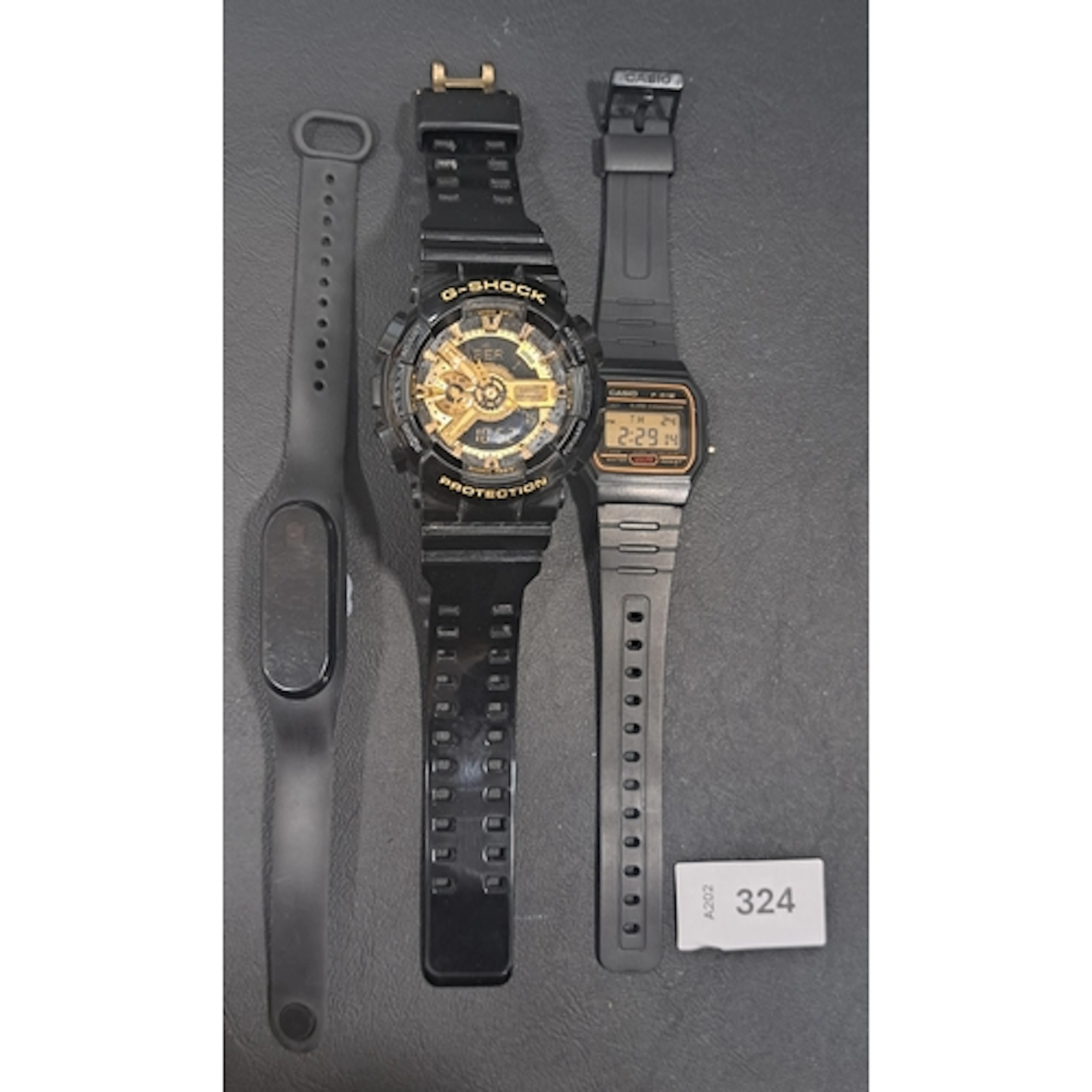 THREE WATCHES comprising a Casio G-Shock GA-110GB; a Casio ...
