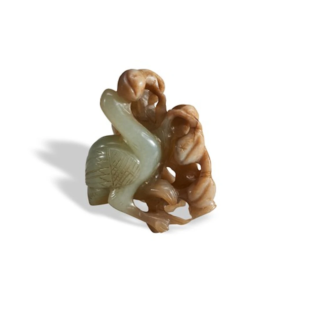 A PALE-CELADON A D CREAMY-RUSSET JADE 'GOOSE AND PEACHES' GR...