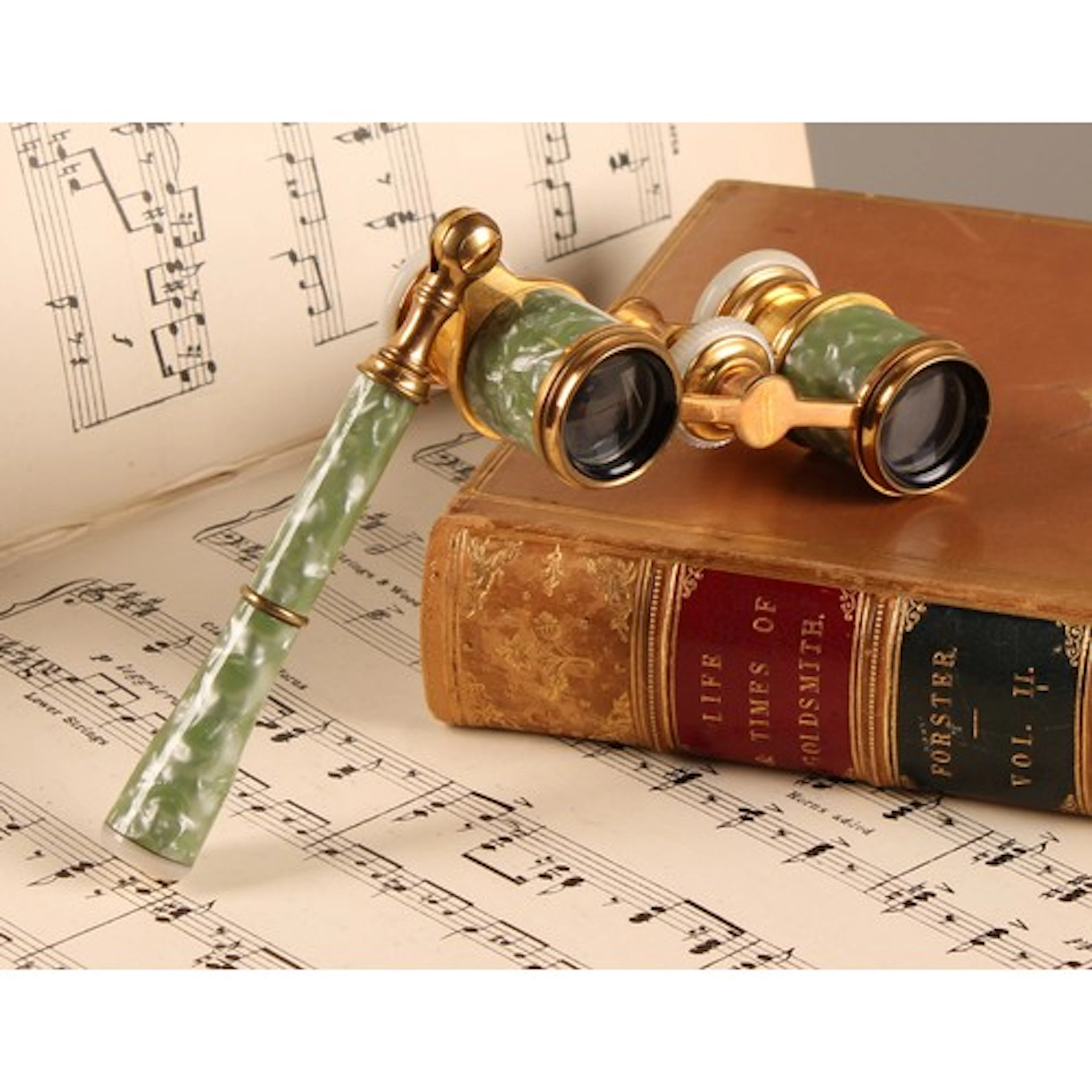 A pair of 19th century French brass and lacquer opera glasse...