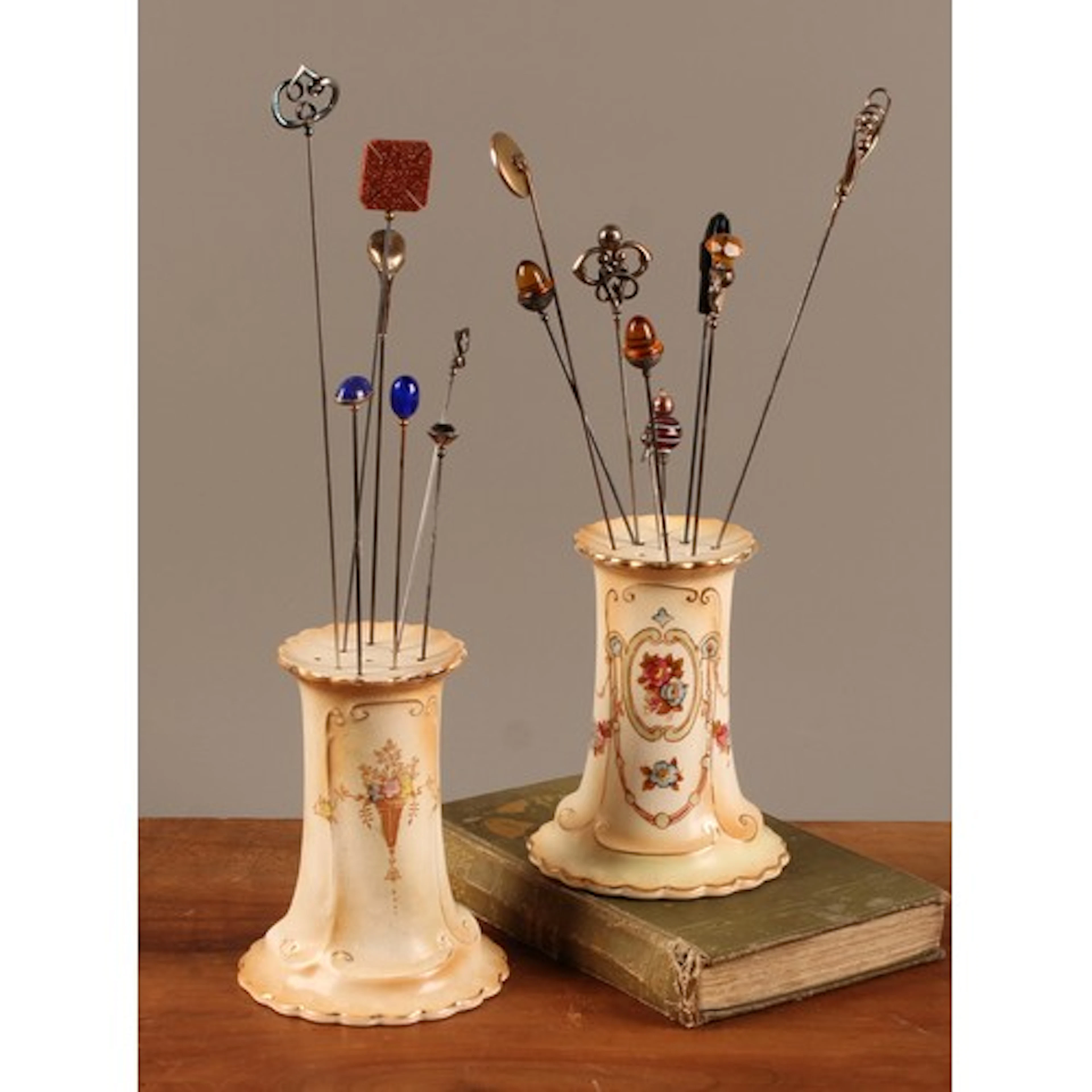 A collection of mainly Edwardian hat pins including Golf clu...