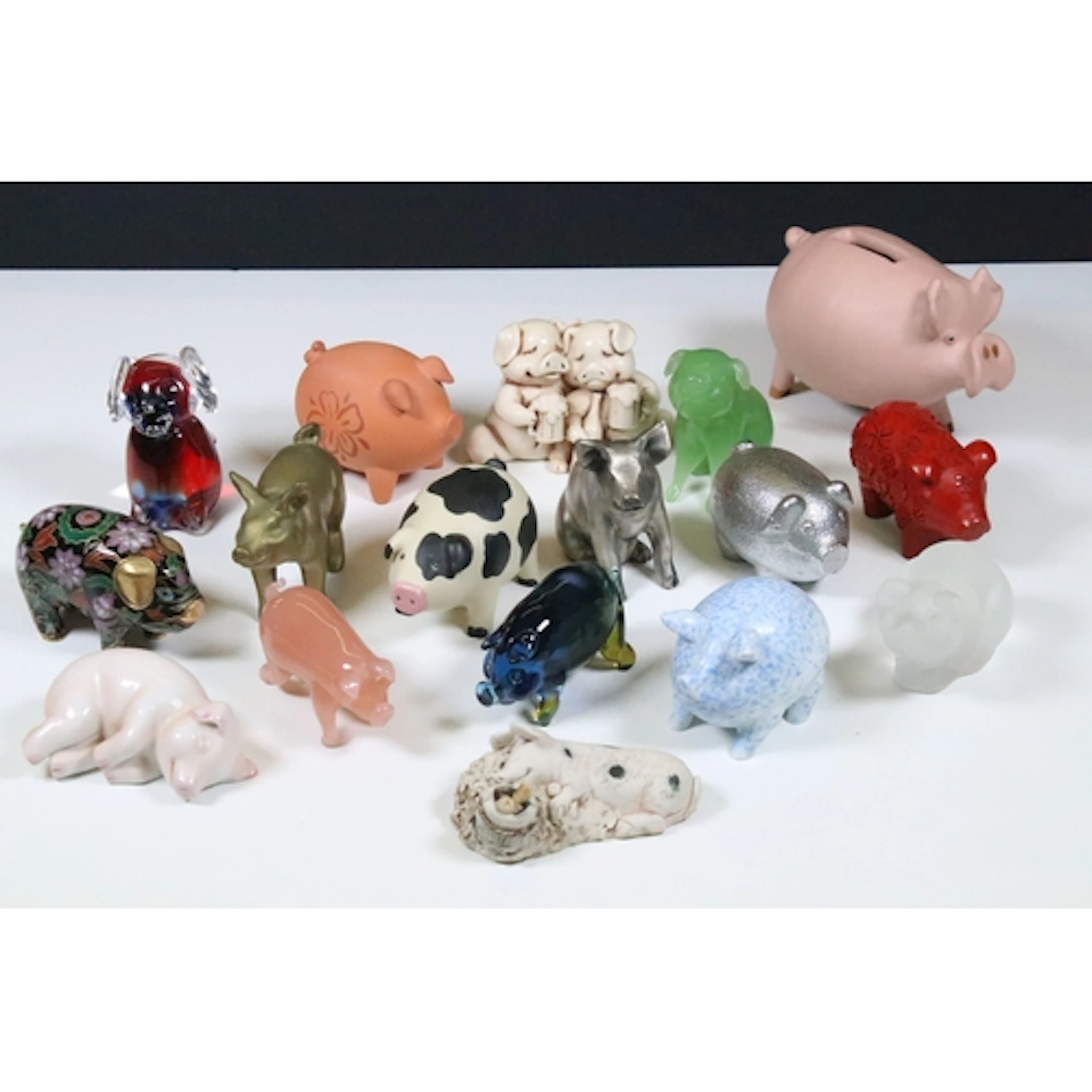 Collection of seventeen figures of pigs, to comprise cloison...