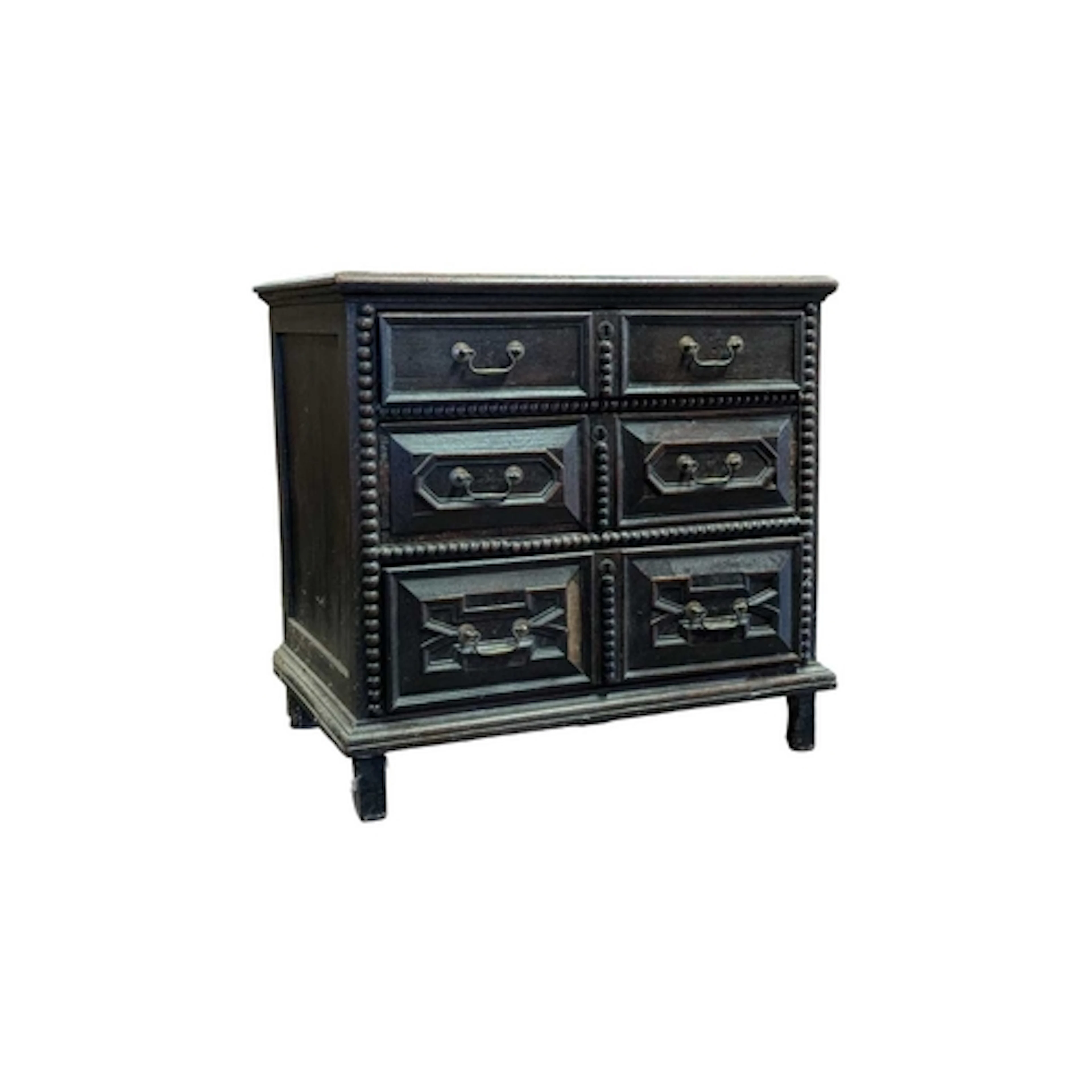 A 17th century Jacobean block-fronted oak chest of drawers. ...