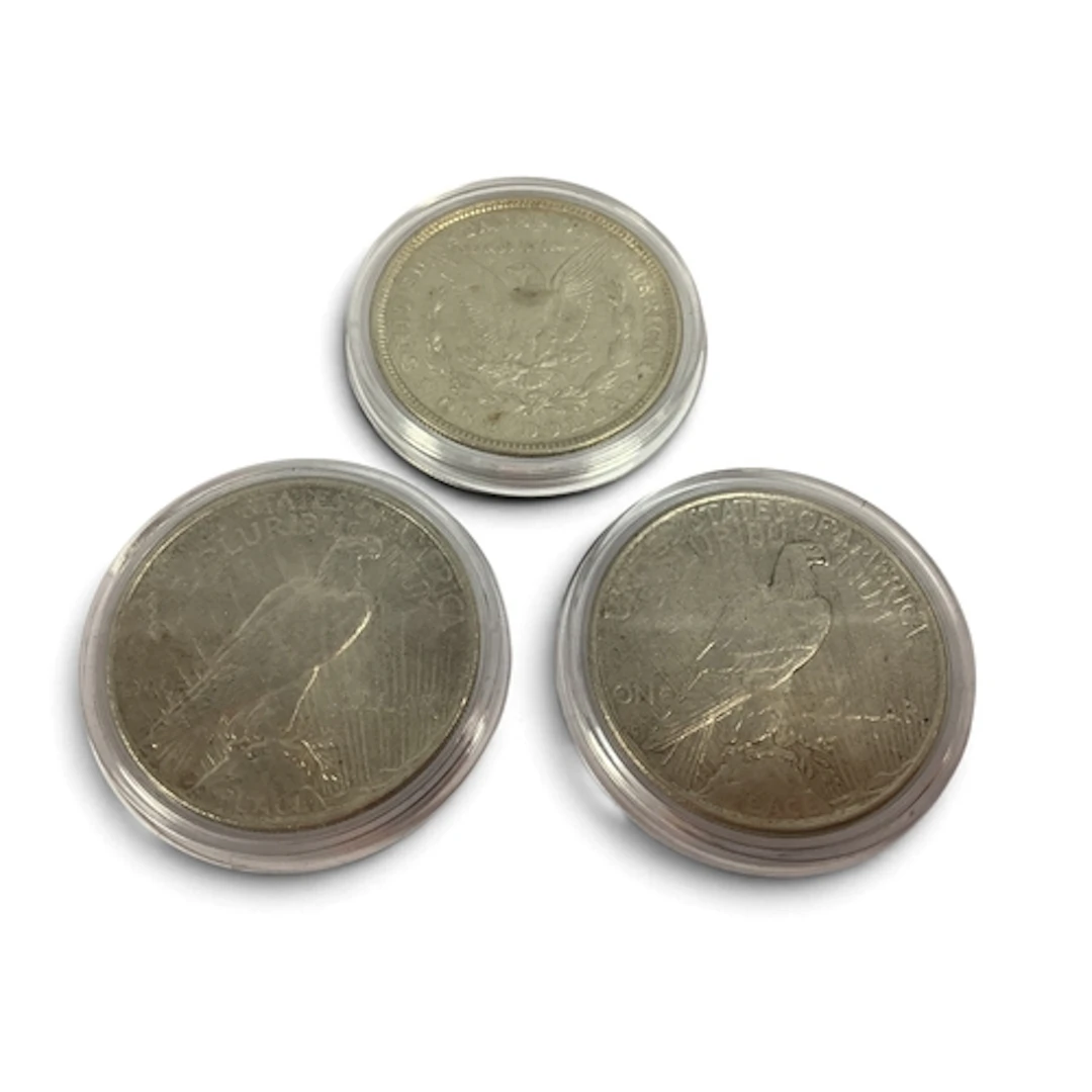 Three USA Silver Dollars, includes a 1921 Morgan, and 1922 a...