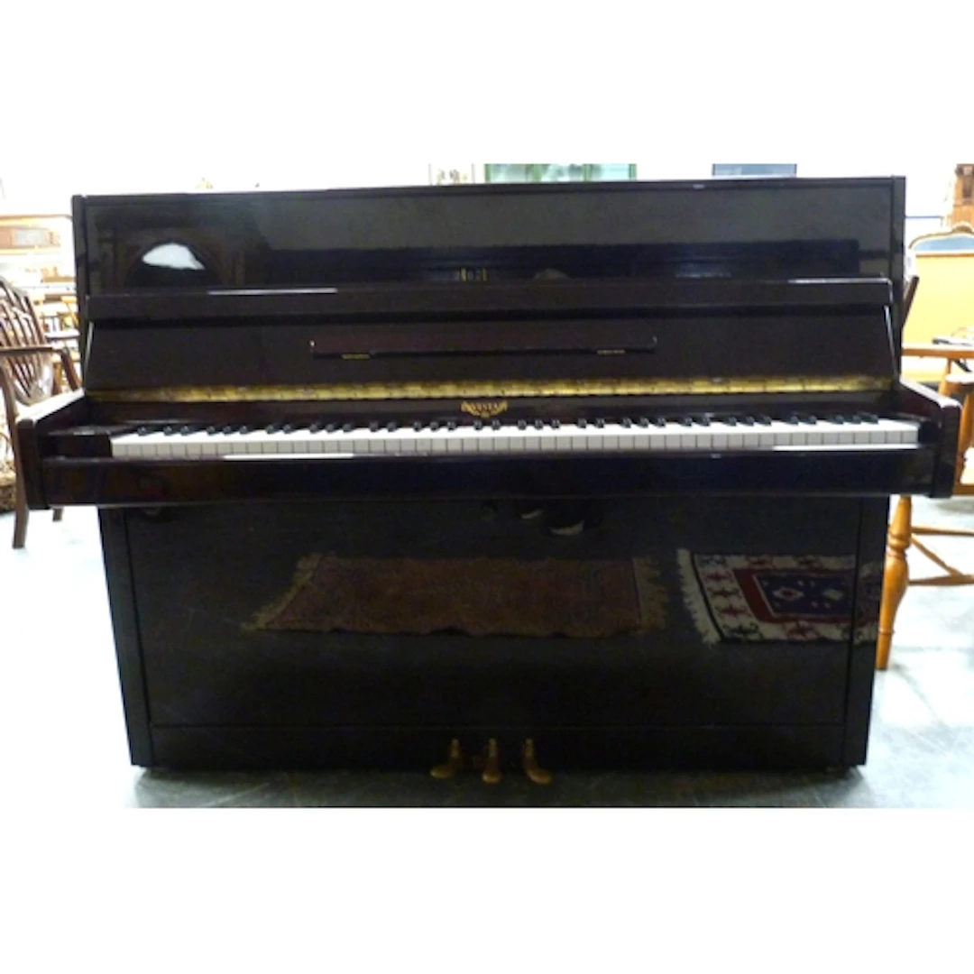 Eaveststaff ebonised cottage piano, No LF 17272.