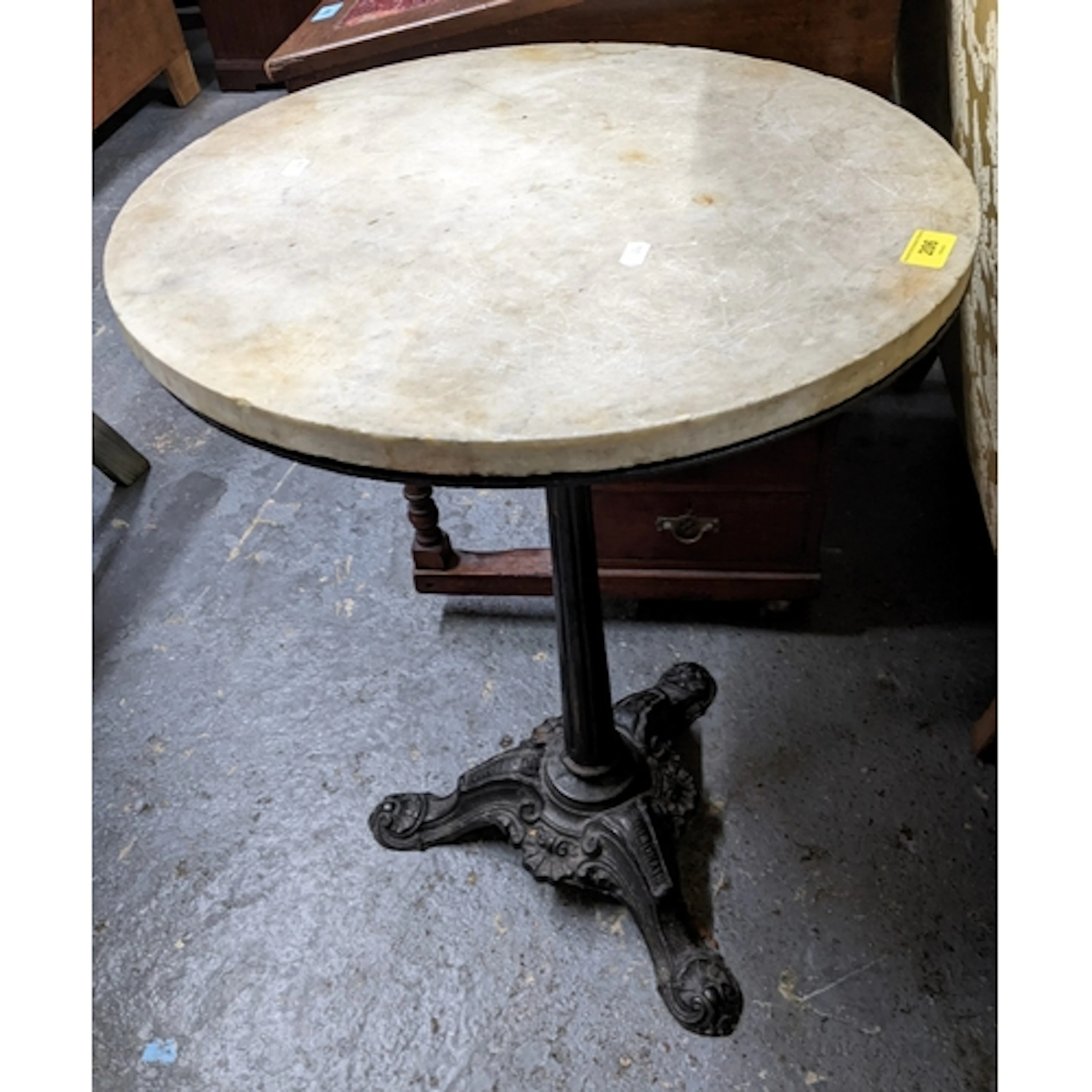 An early 20th century French cast iron and variegated white ...