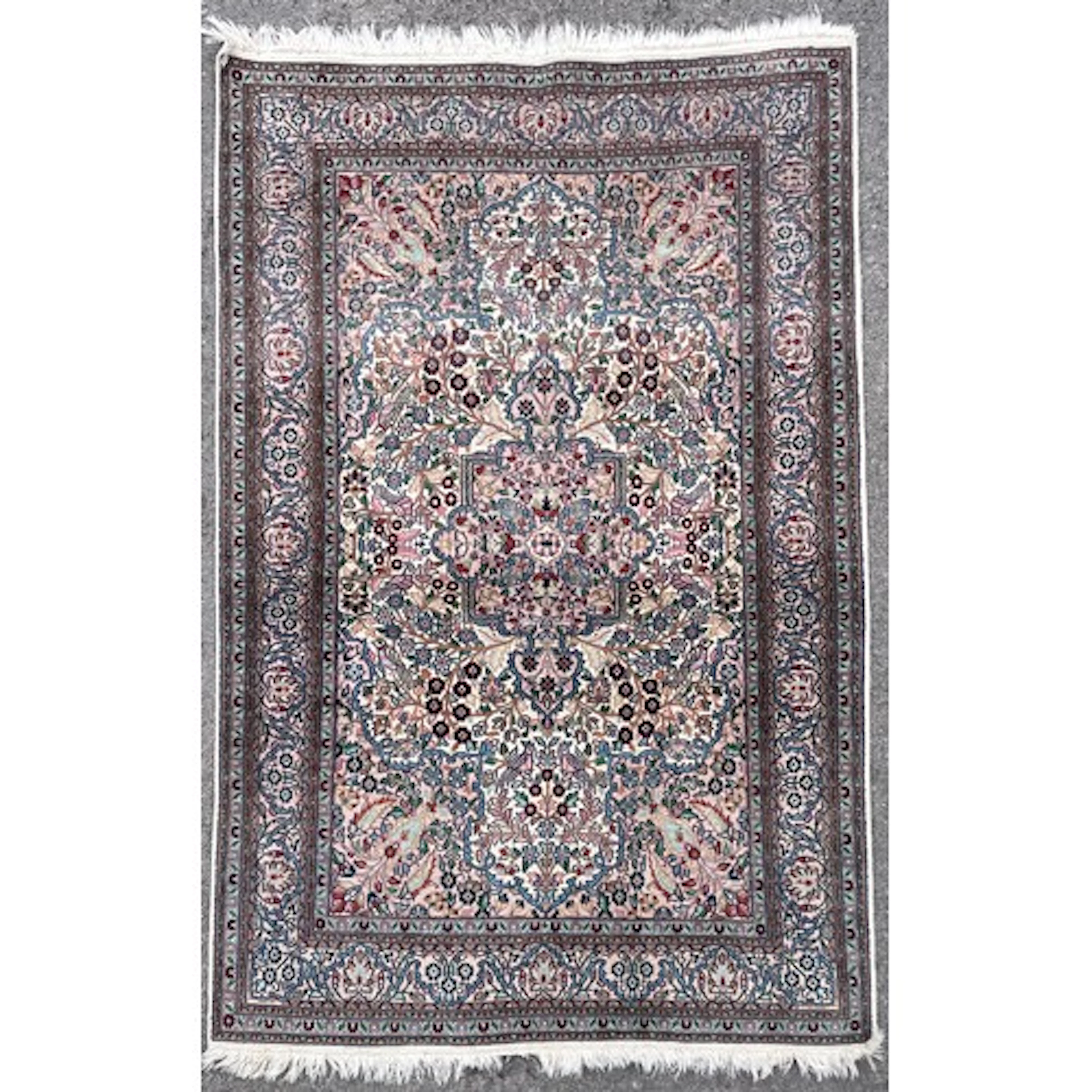 A Persian Isfahan type rug or carpet, 191cm x 120cm