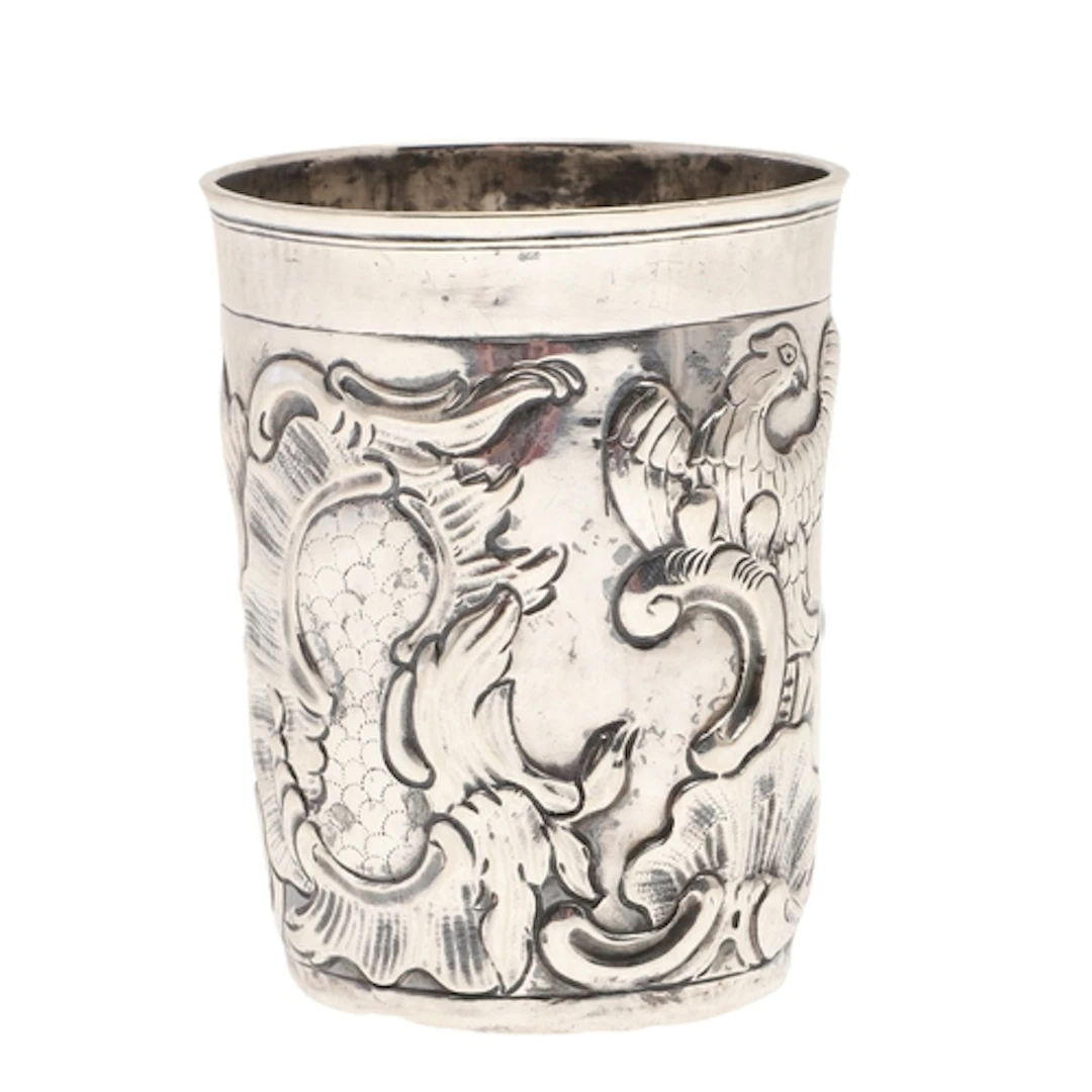A RUSSIAN 18TH CENTURY SILVER BEAKER. With repousse decorati...