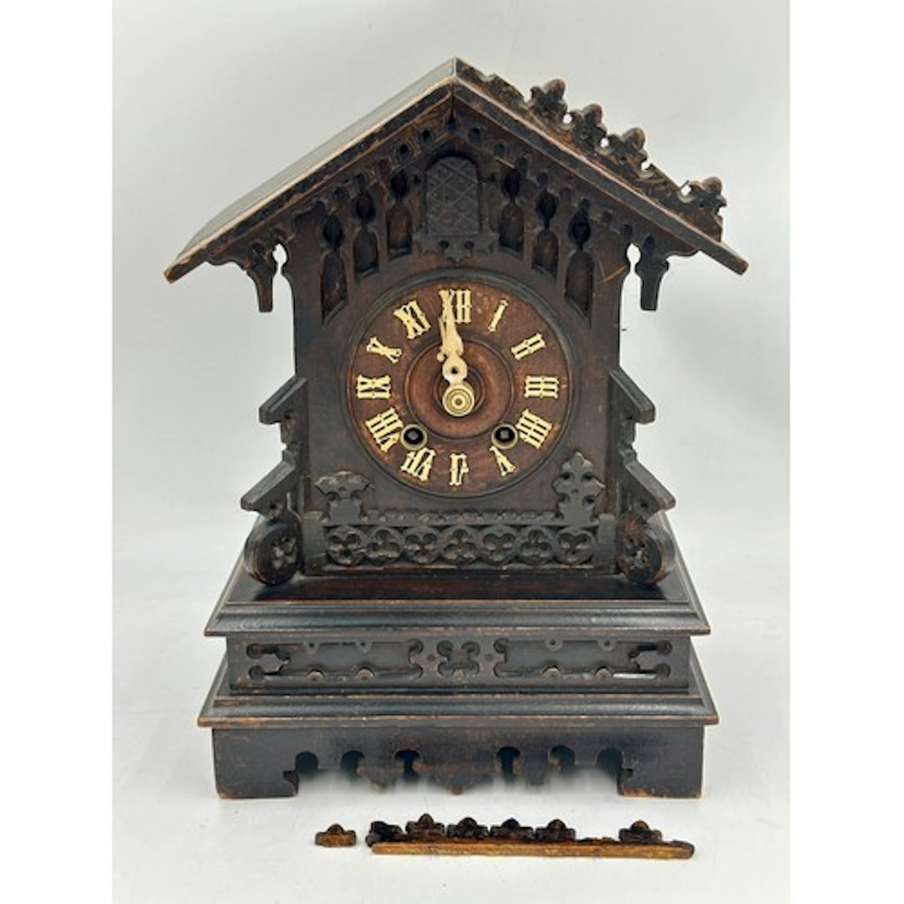 A 19thC German Black Forest mantle cuckoo clock with bone ha...