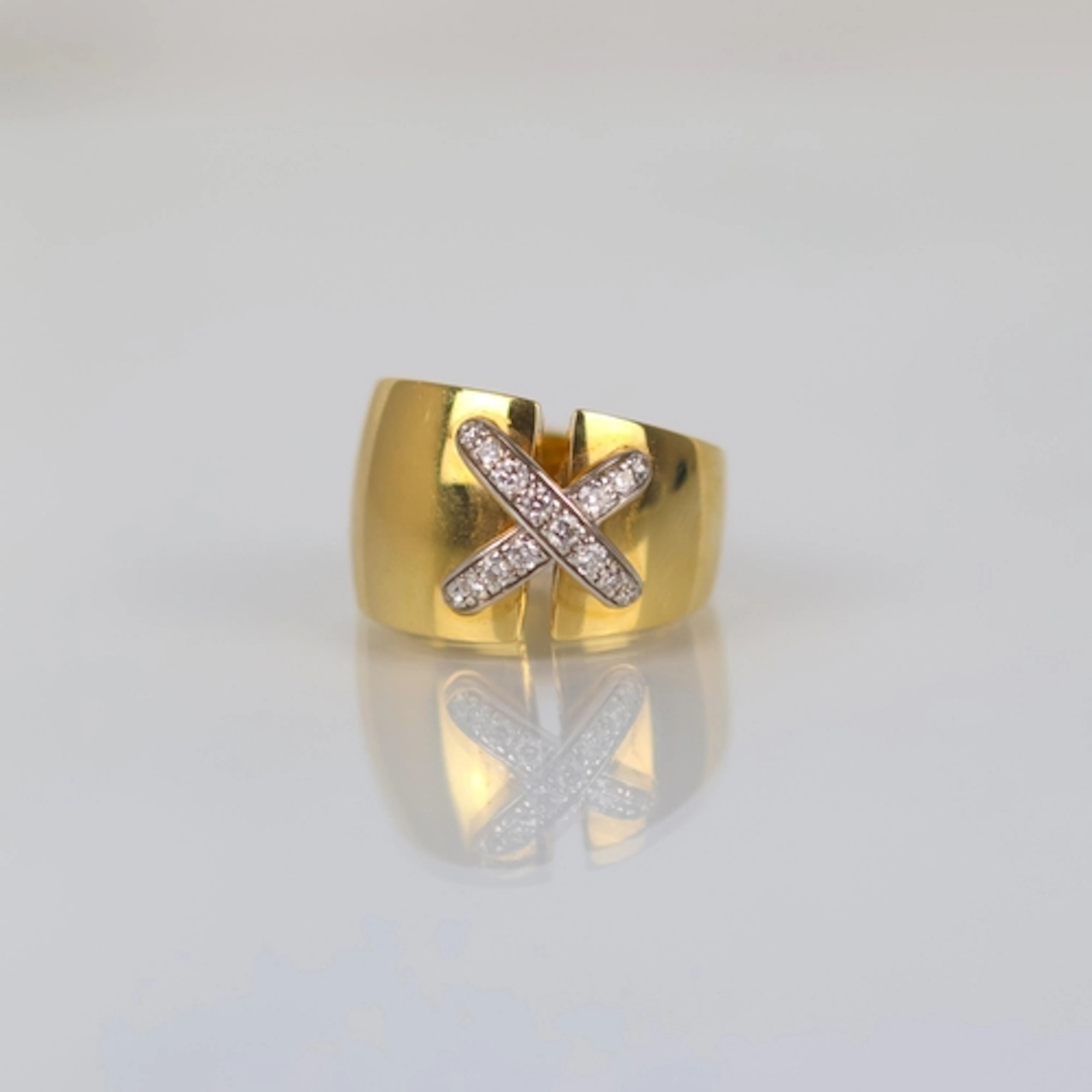 A French diamond ring, signed Chaumet, in the style of the L...