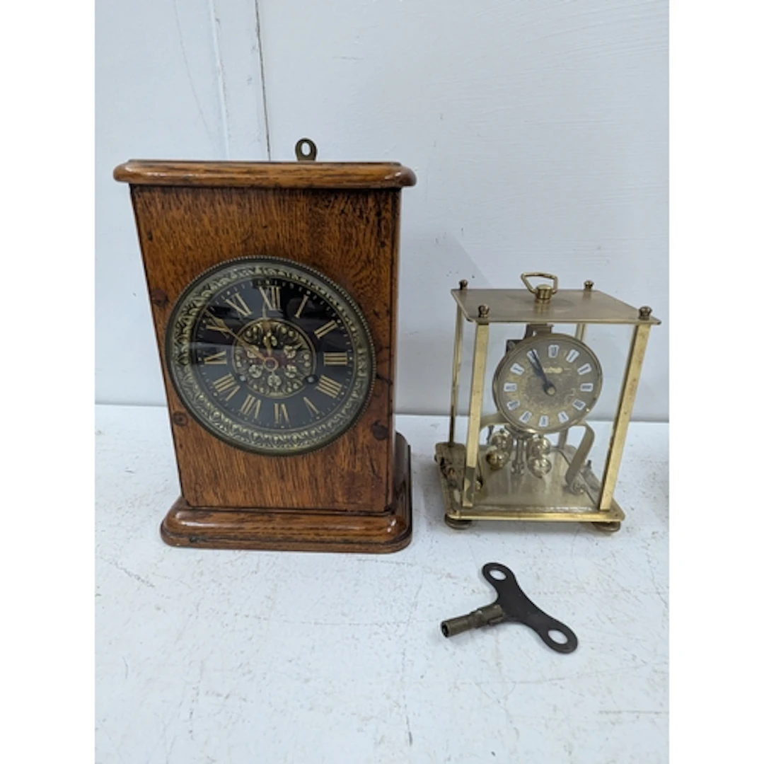 A circa 1900 oak mantle clock fitted with an 8-day Mougin mo...
