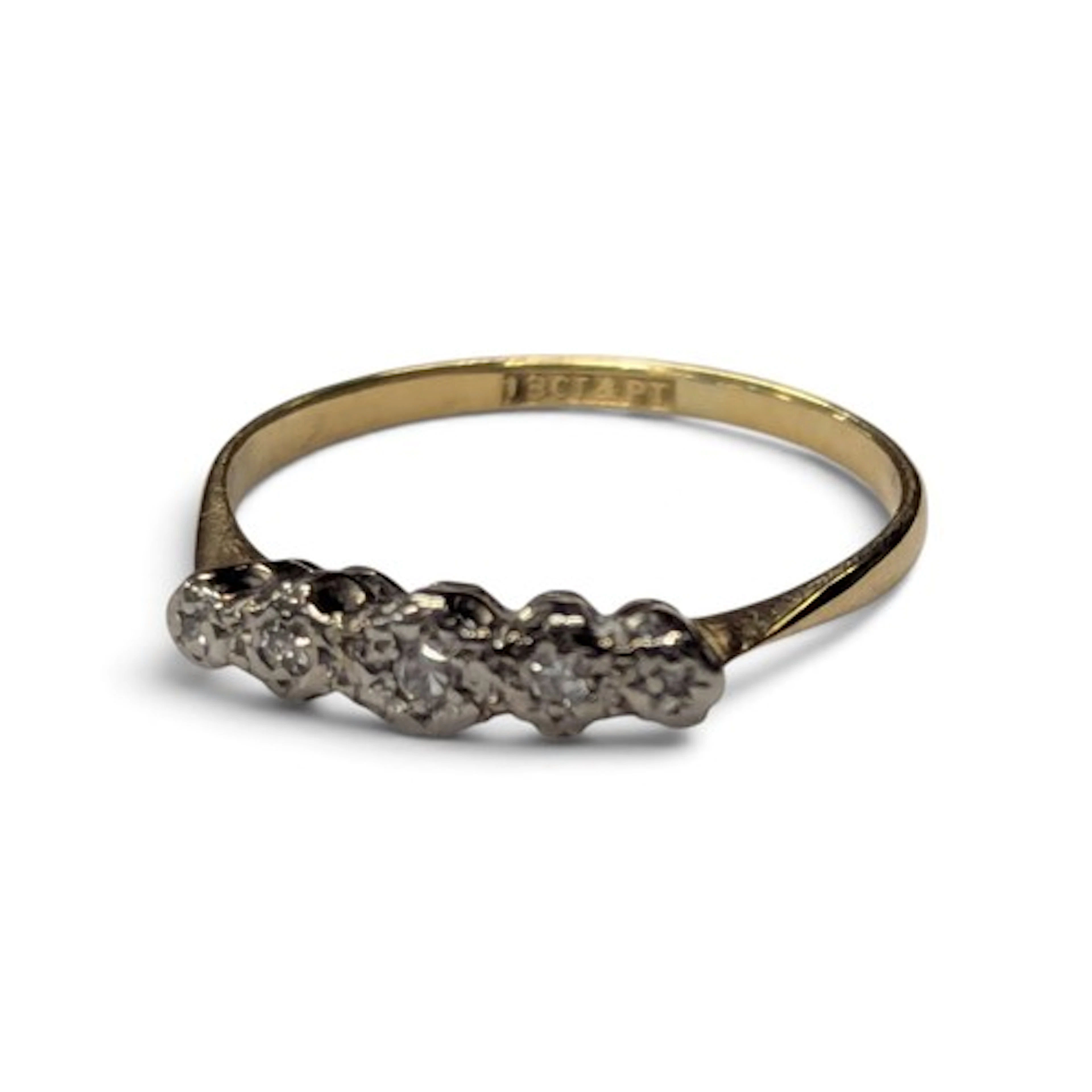 An 18ct gold, diamond and platinum ring, stamped '18ct & pt'...