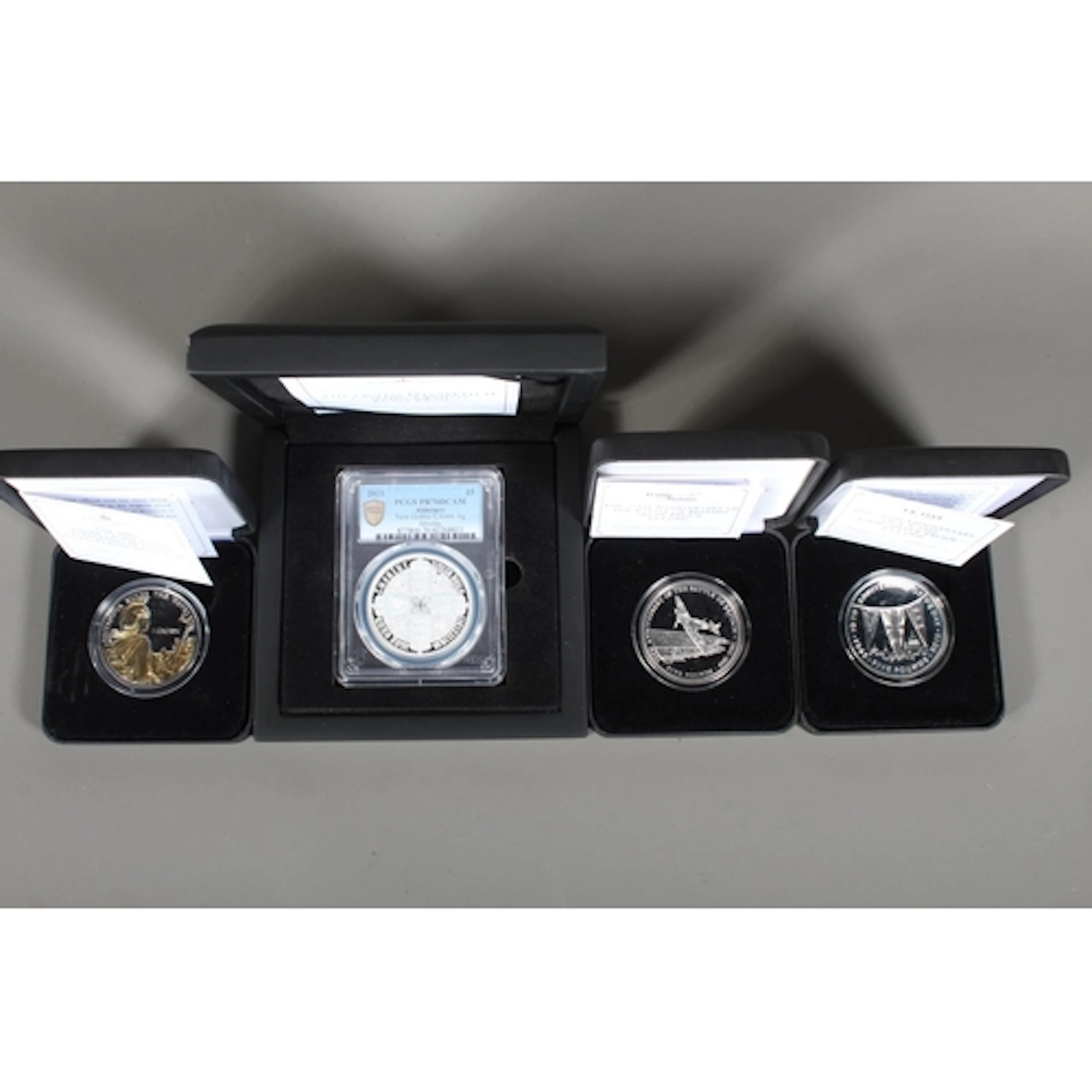 Four silver proof coins to include: ALDERNEY Queen Elizabet...