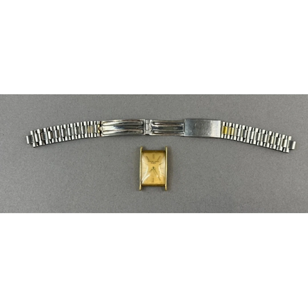 Watches: a gentleman's rectangular cased yellow metal watch ...