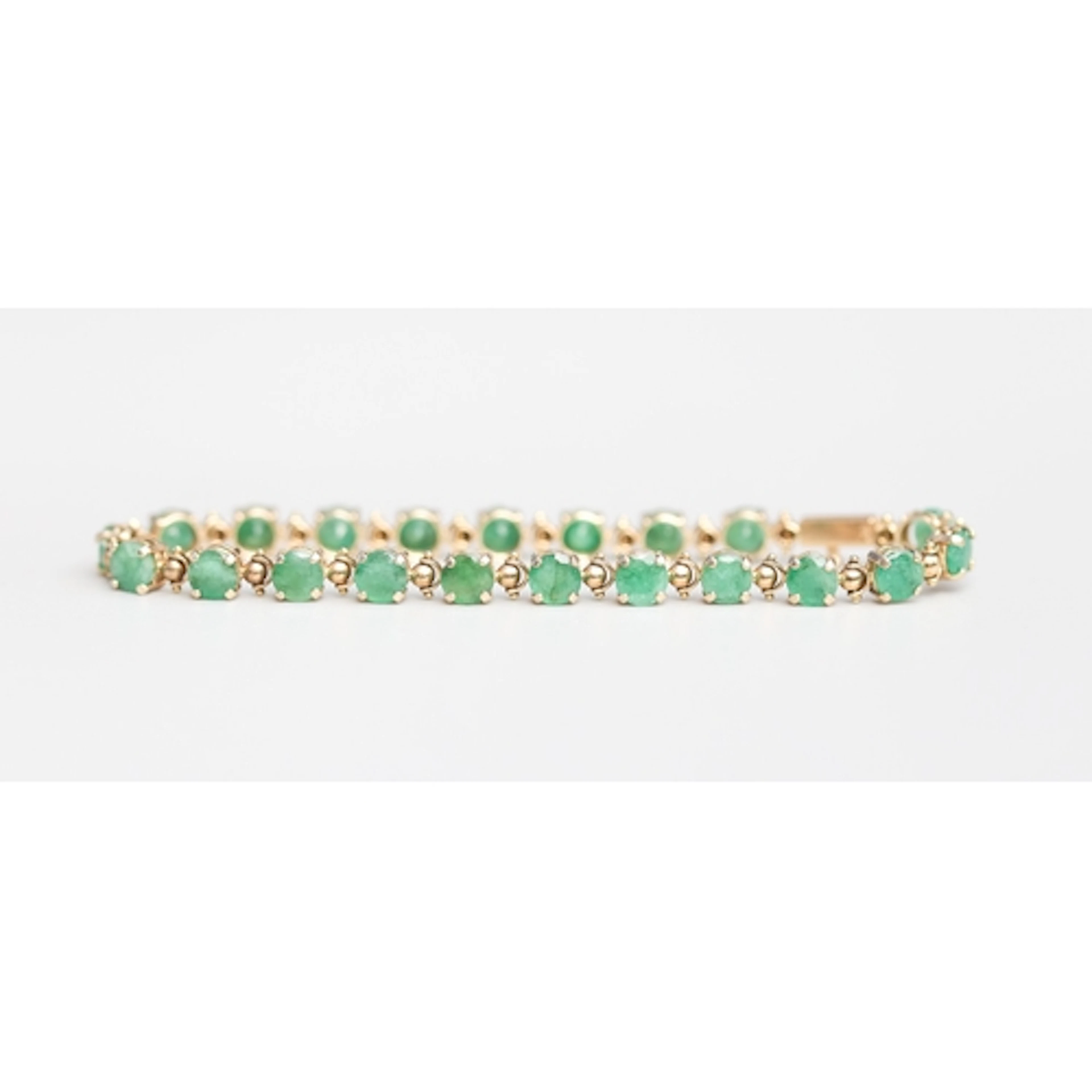 Emerald Twenty - One Stone Set Fancy Link Tennis Bracelet, M...