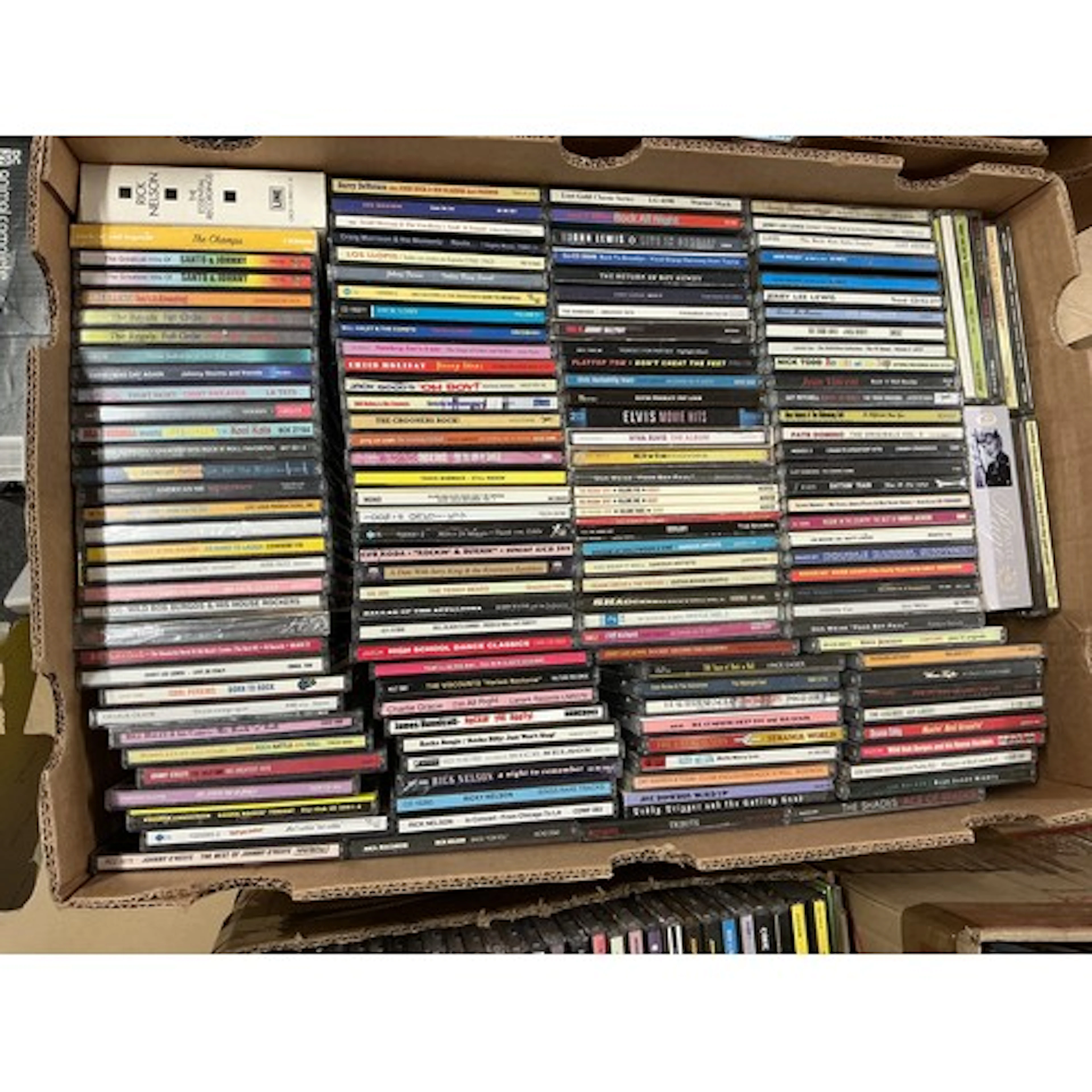 Two boxes of rock n roll and rockabilly CDs and cassettes by...