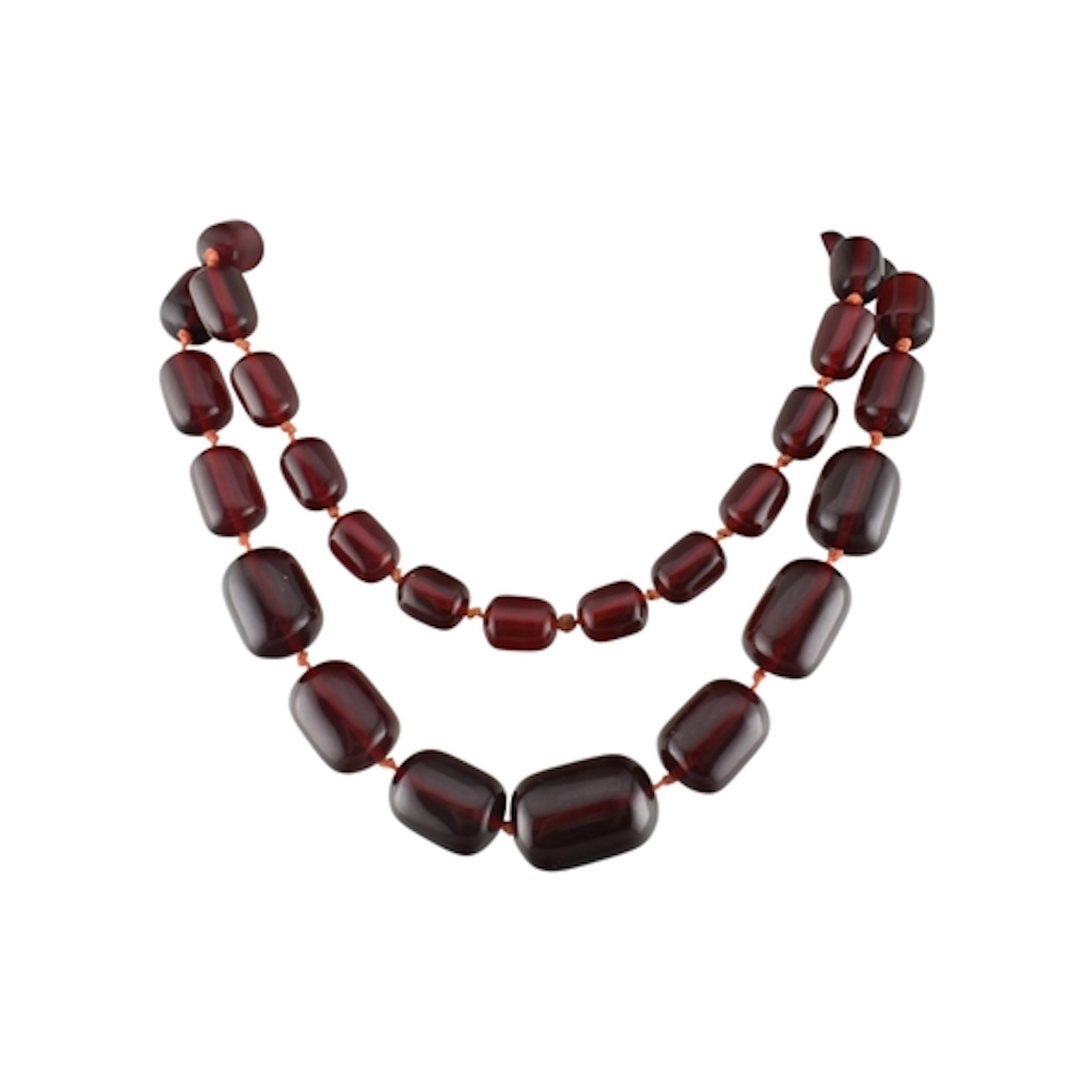An early red plastic bead necklace. The necklace with knotte...