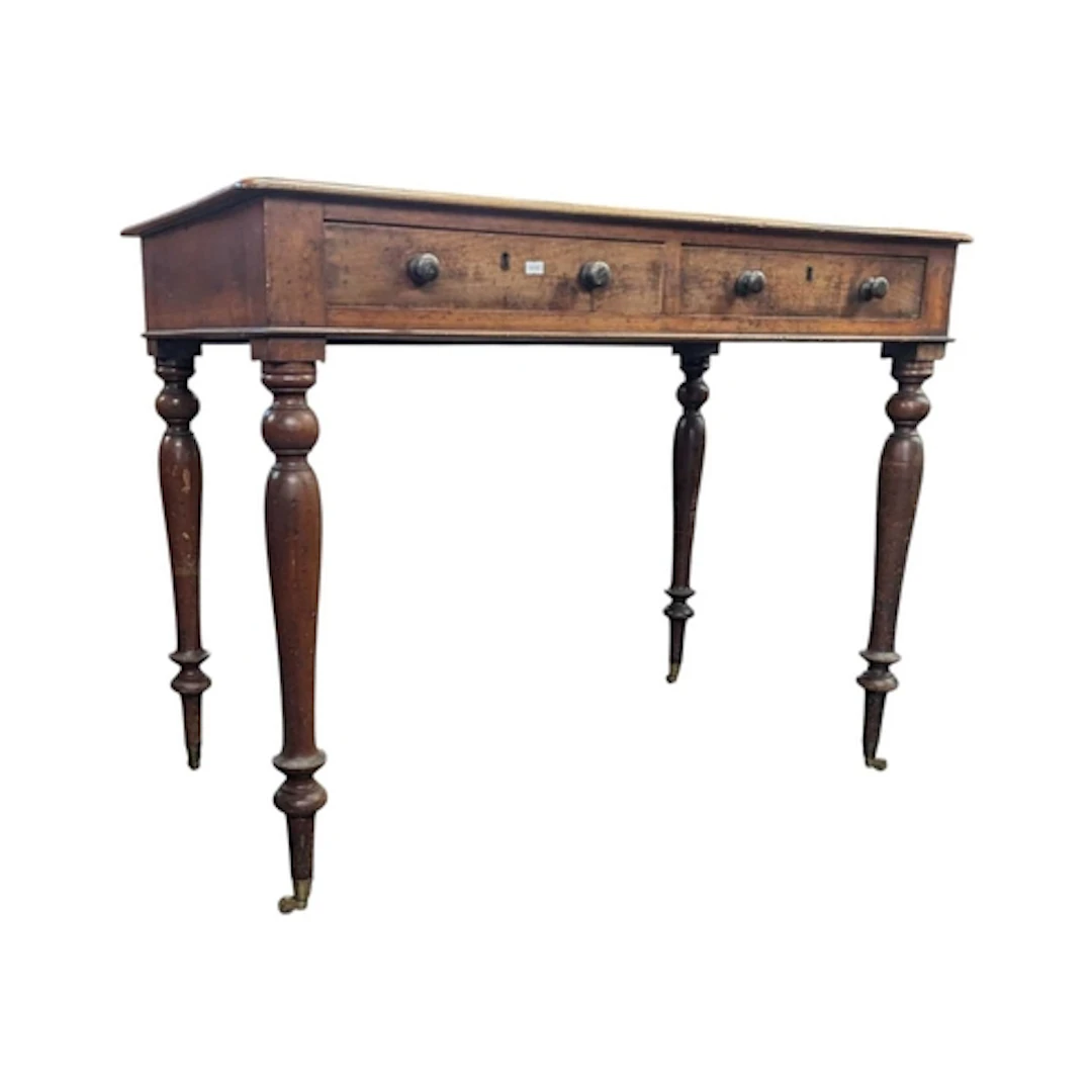 A 19th century Victorian mahogany writing table. The table h...