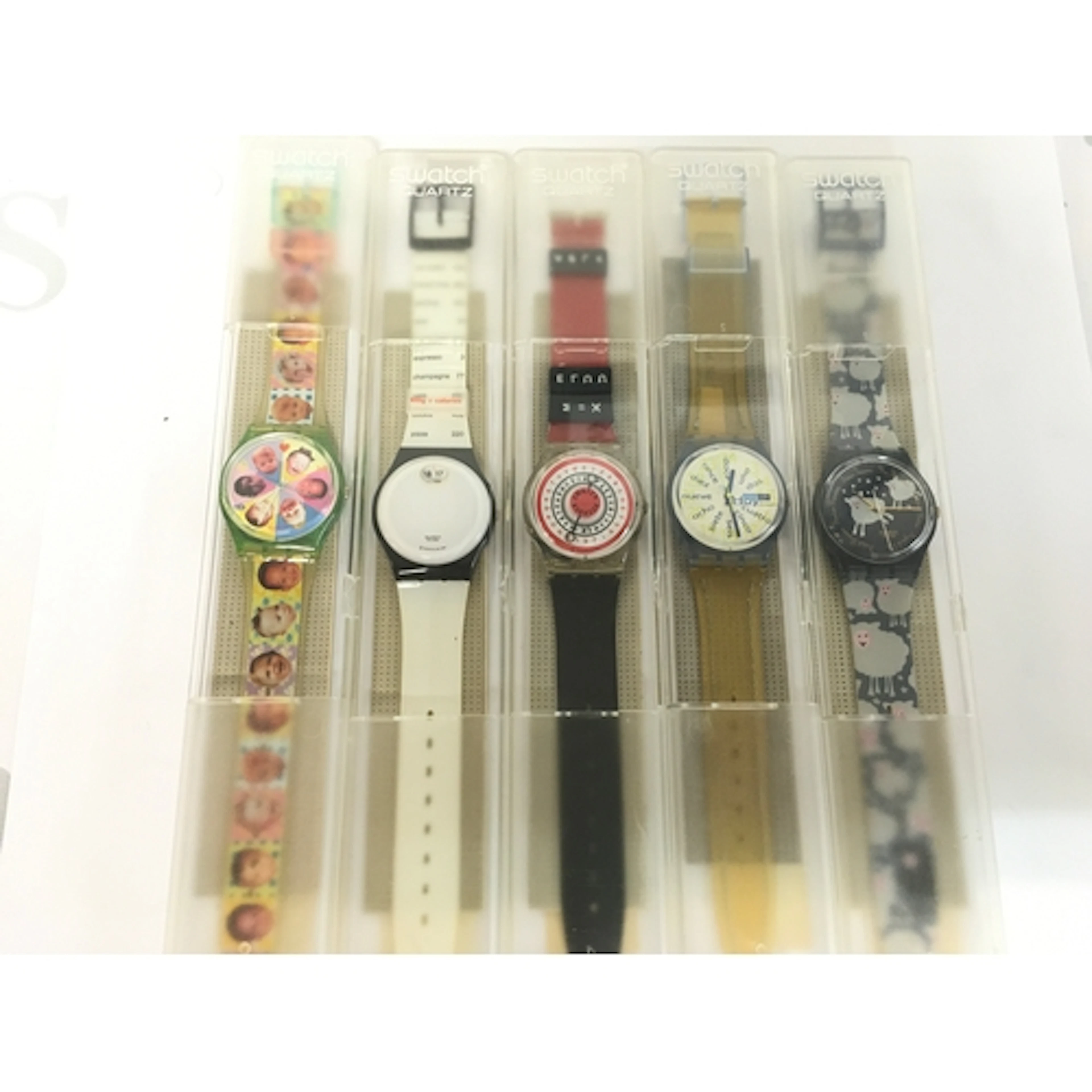 collection features five vintage Swatch watches in their ori...