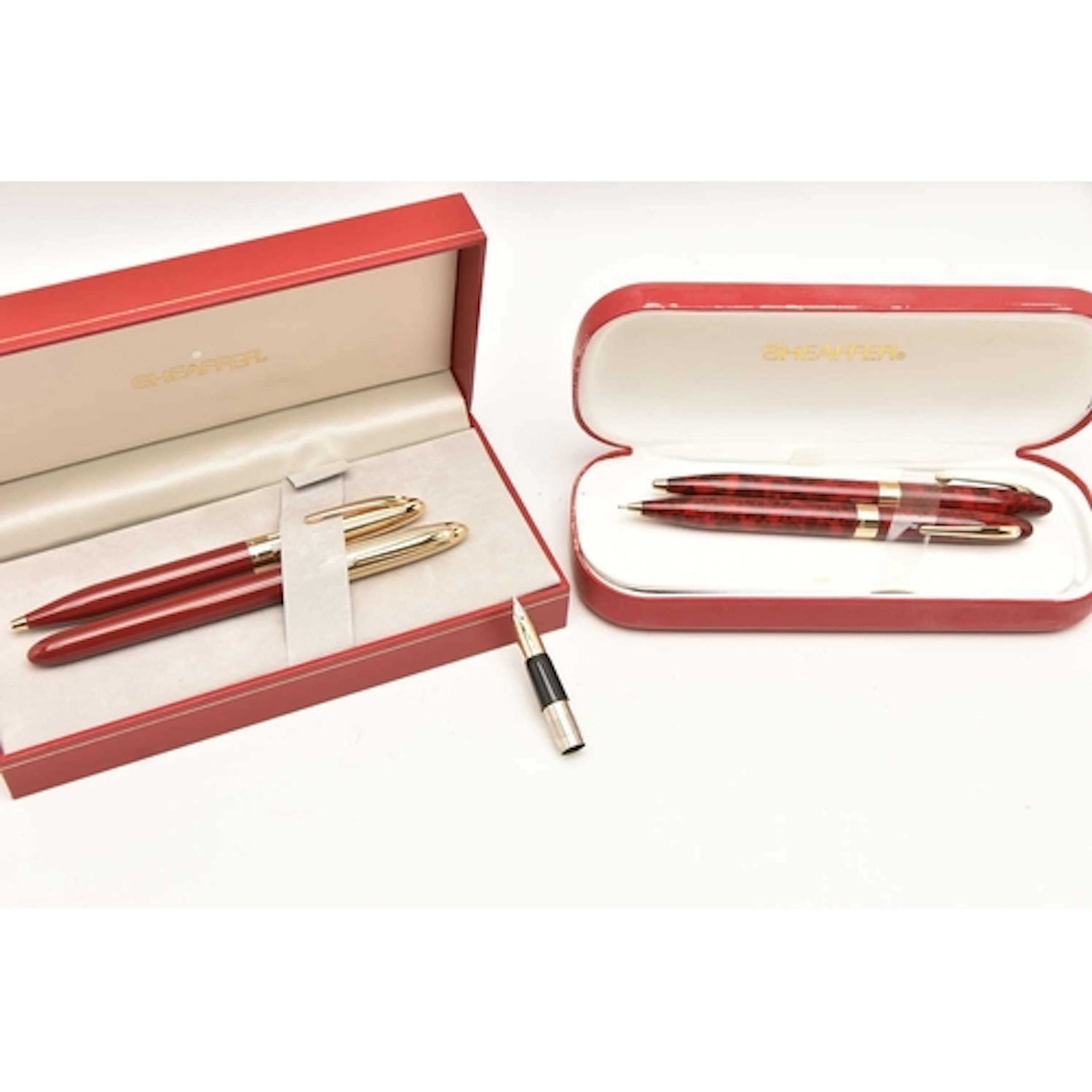 TWO CASED SETS OF 'SHEAFFER' PENS, to include a cased set in...