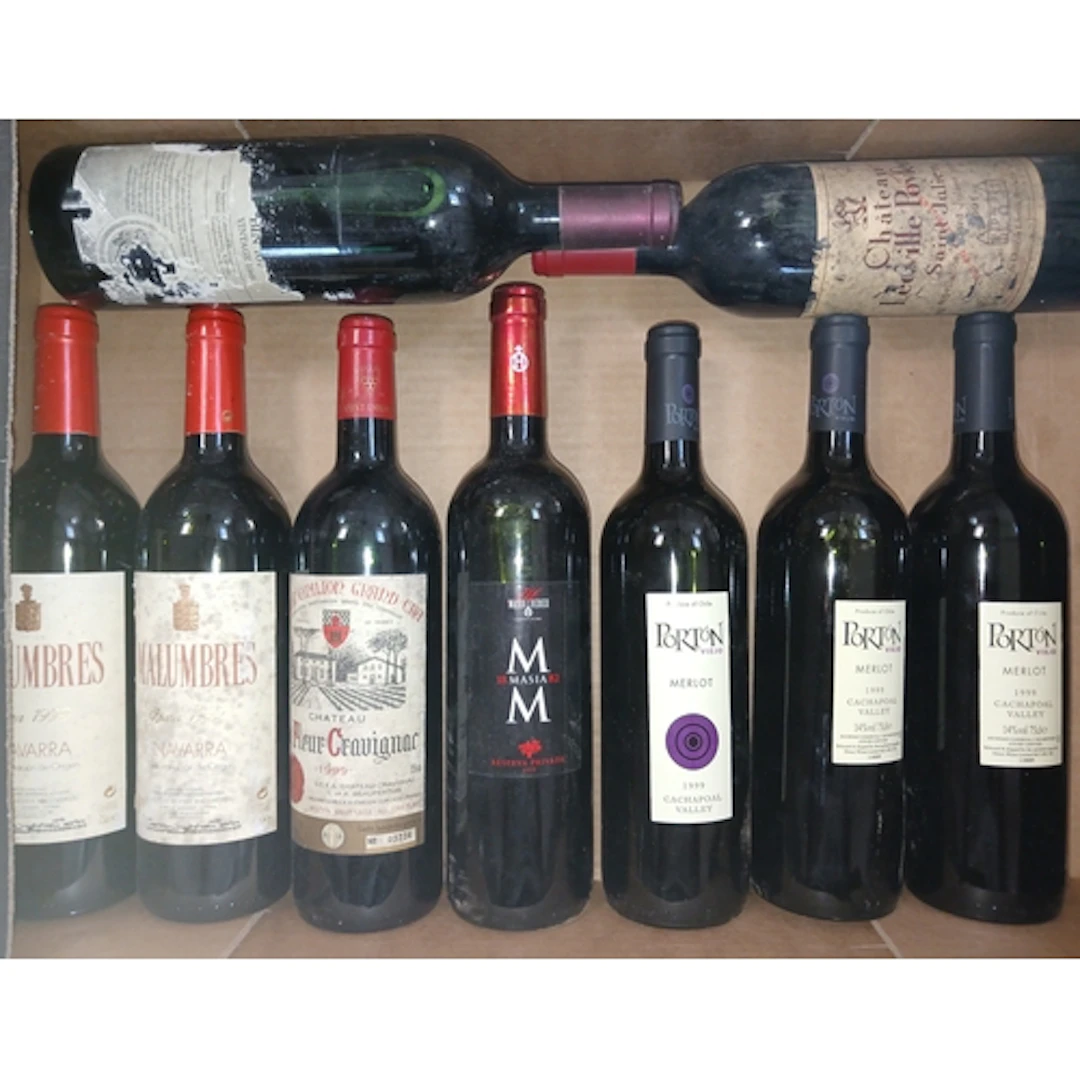 Nine bottles of assorted vintage red wine including Malumbre...