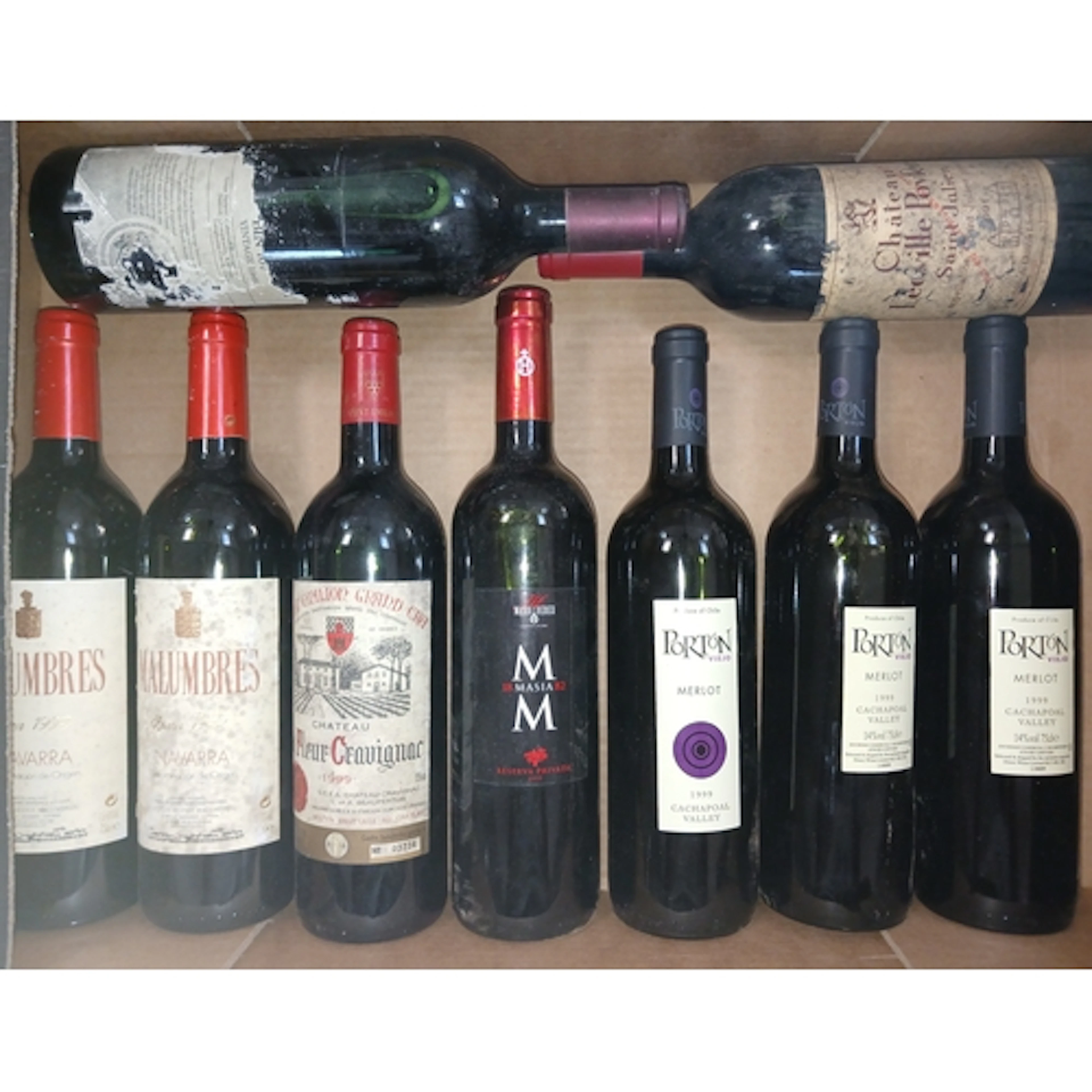 Nine bottles of assorted vintage red wine including Malumbre...