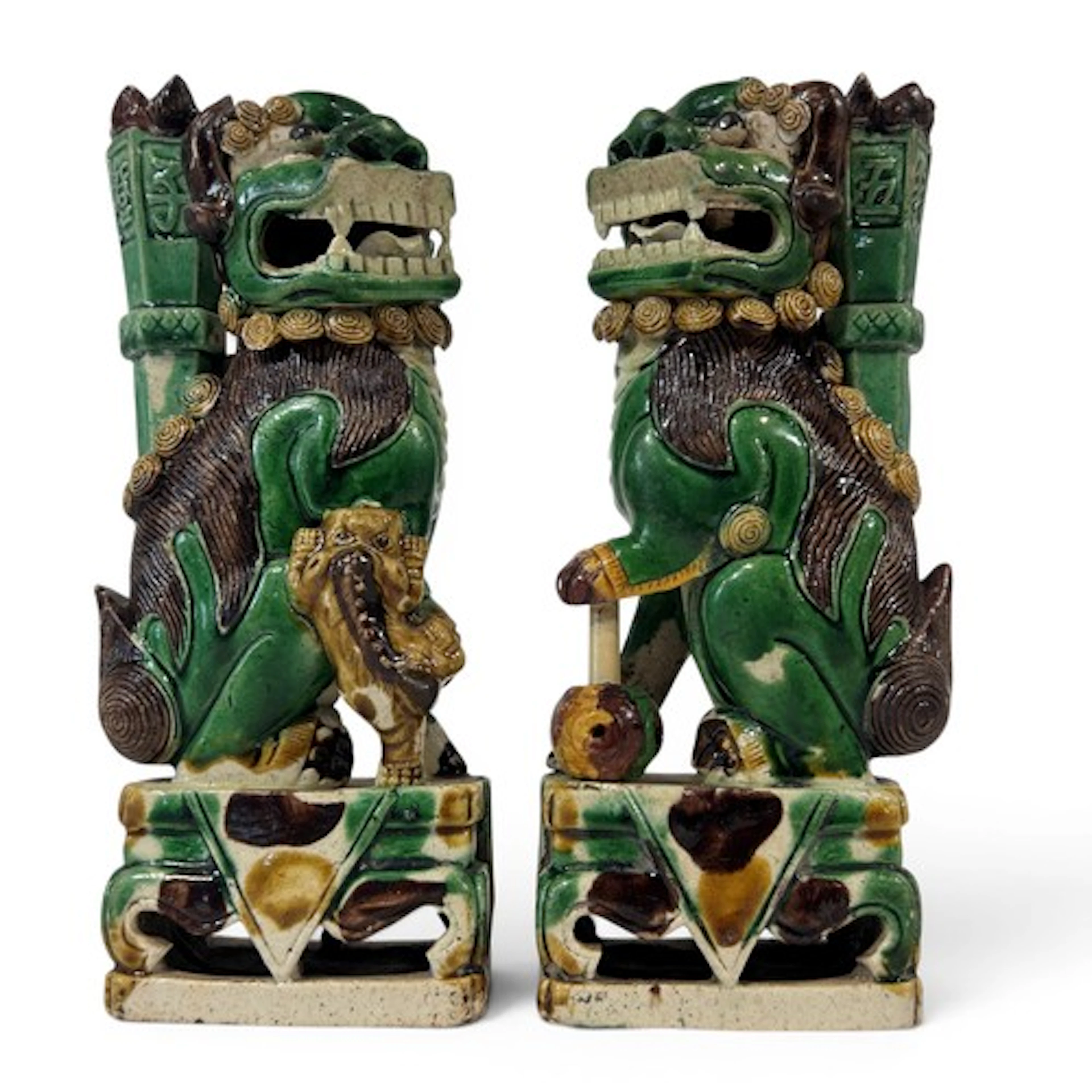 A pair of 18th century Chinese Sancai pottery figures in the...