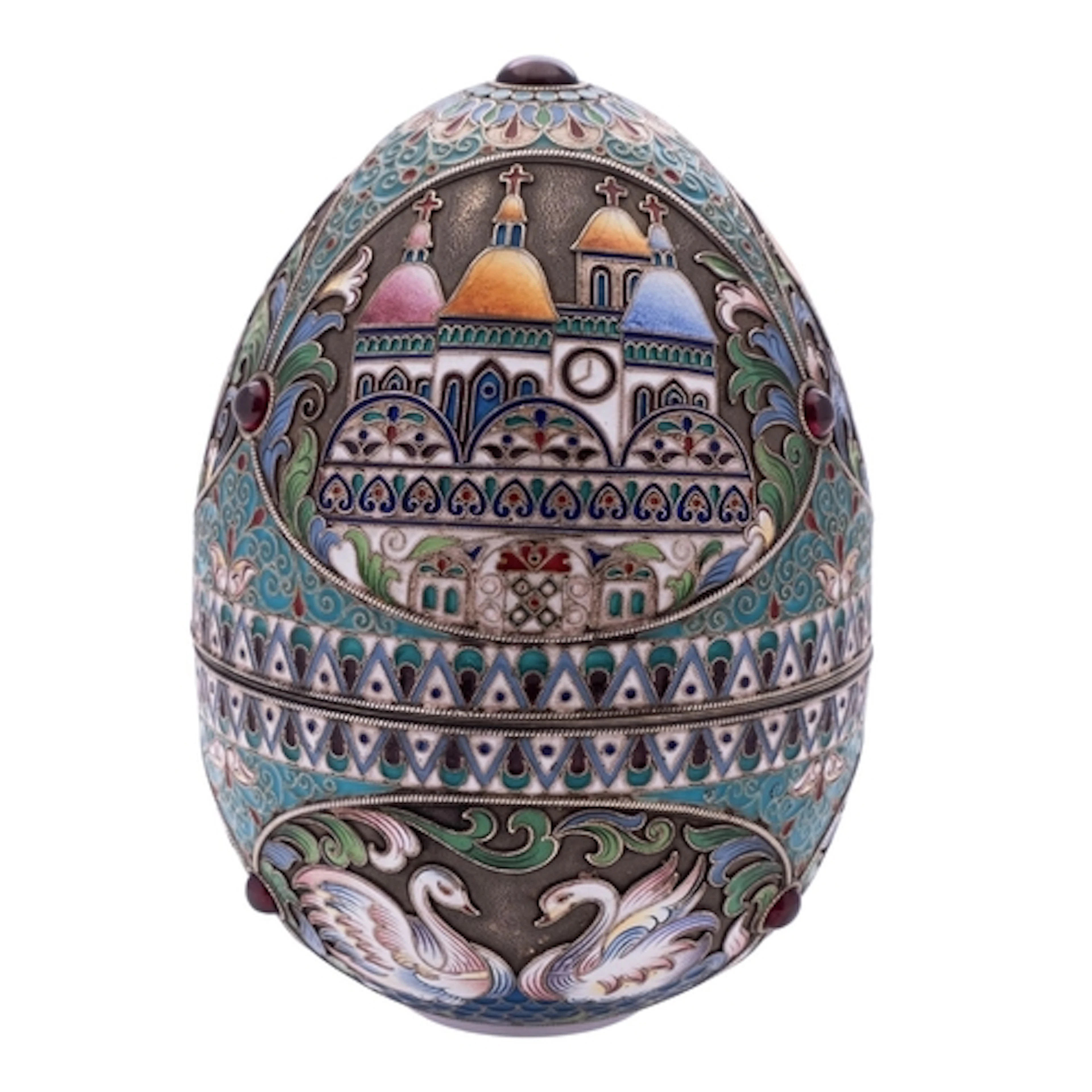 An early 20th century Russian silver & enamel egg, with cord...