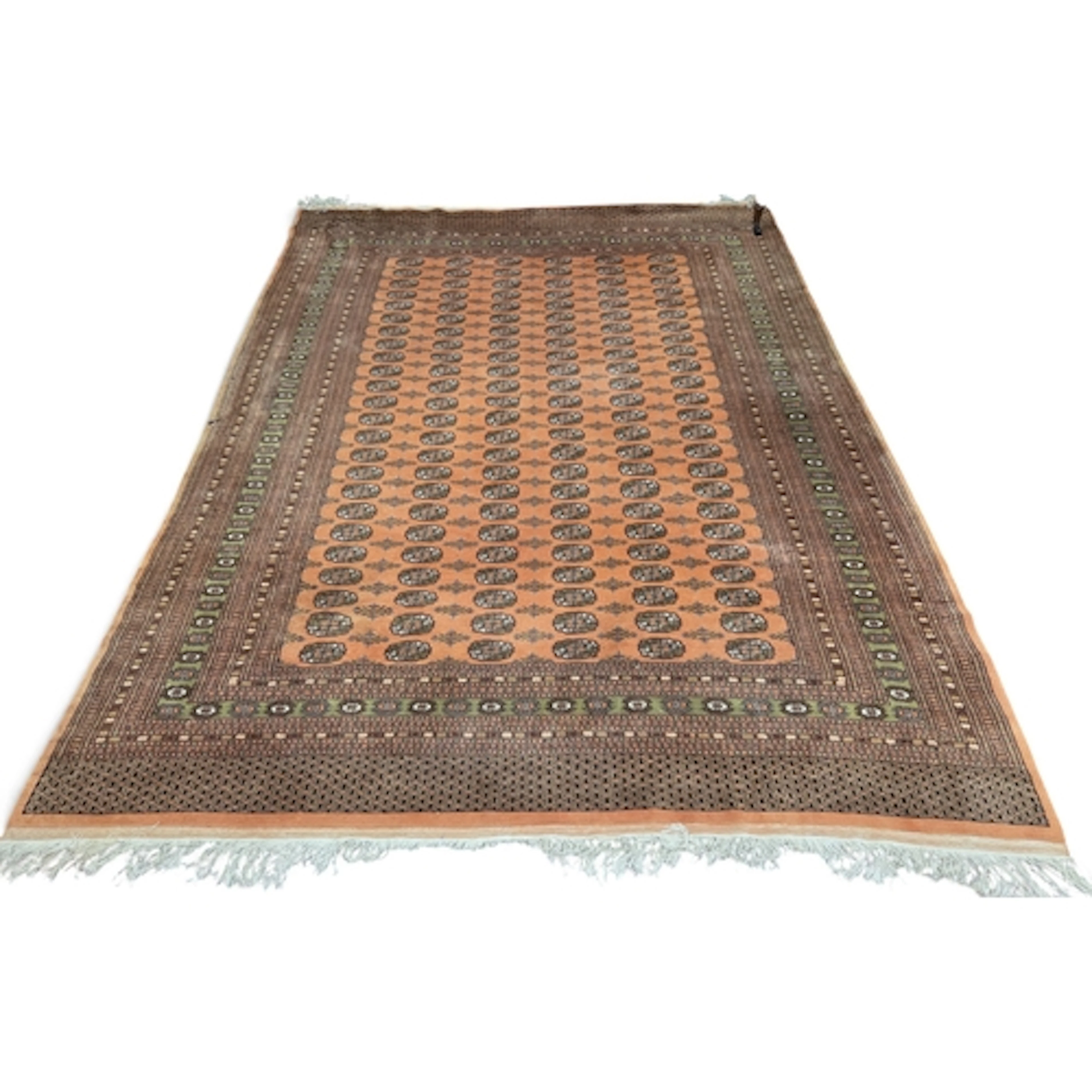 A large Persian Bokhara style Red Rust ground Carpet, with r...