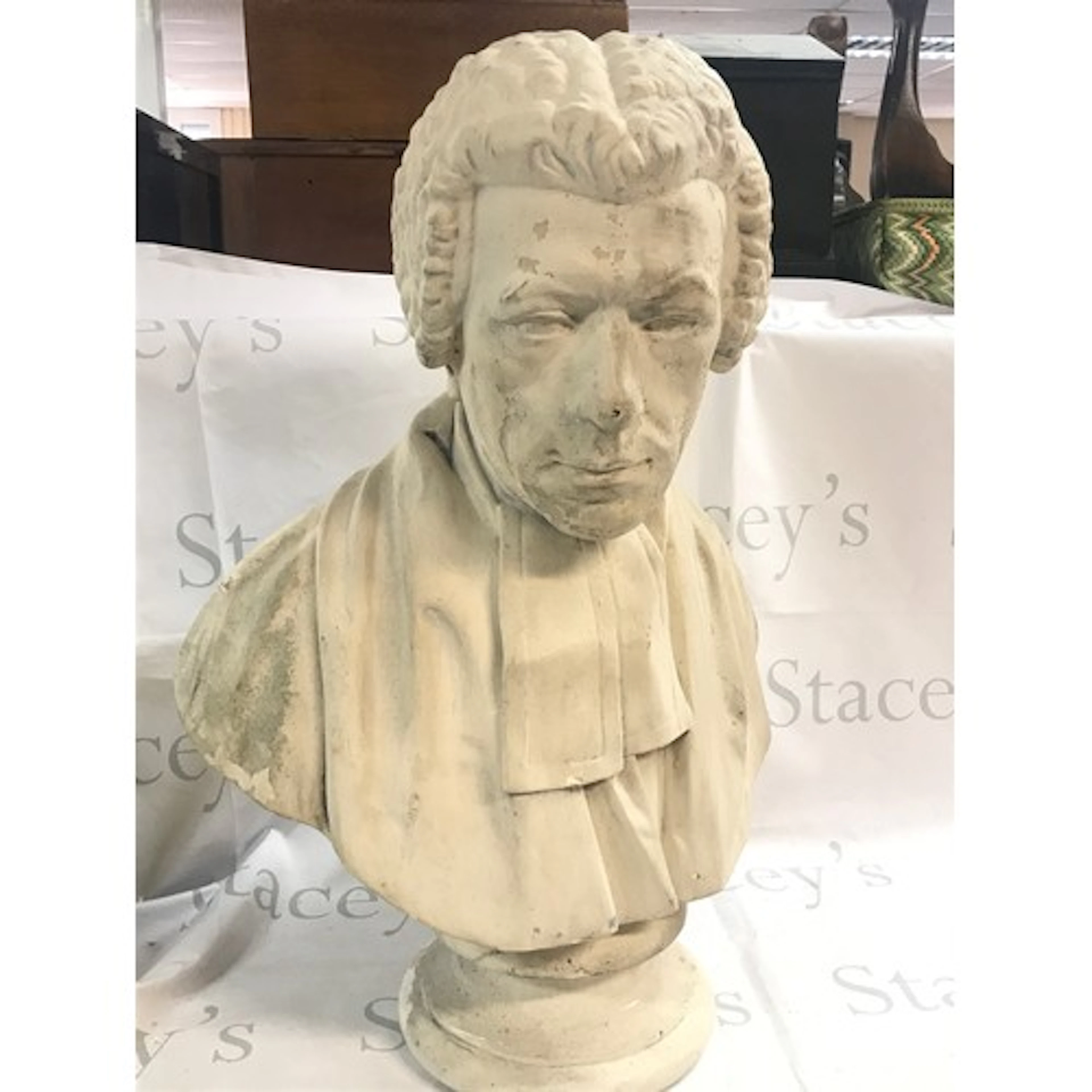 A plaster bust of a Gentleman, 68cm tall