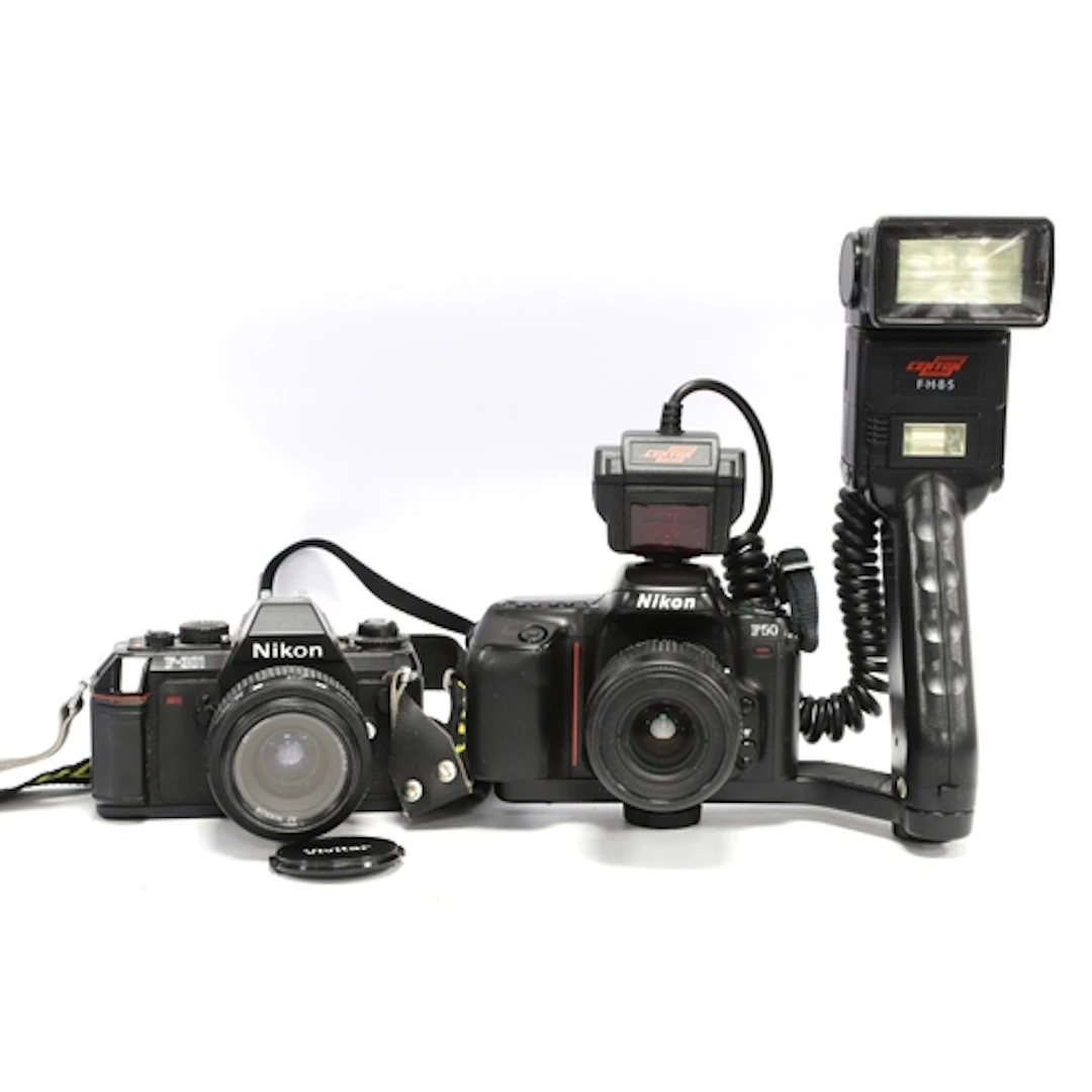Nikon F50 35mm SLR Film Camera with attached Nikon AF Nikkor...