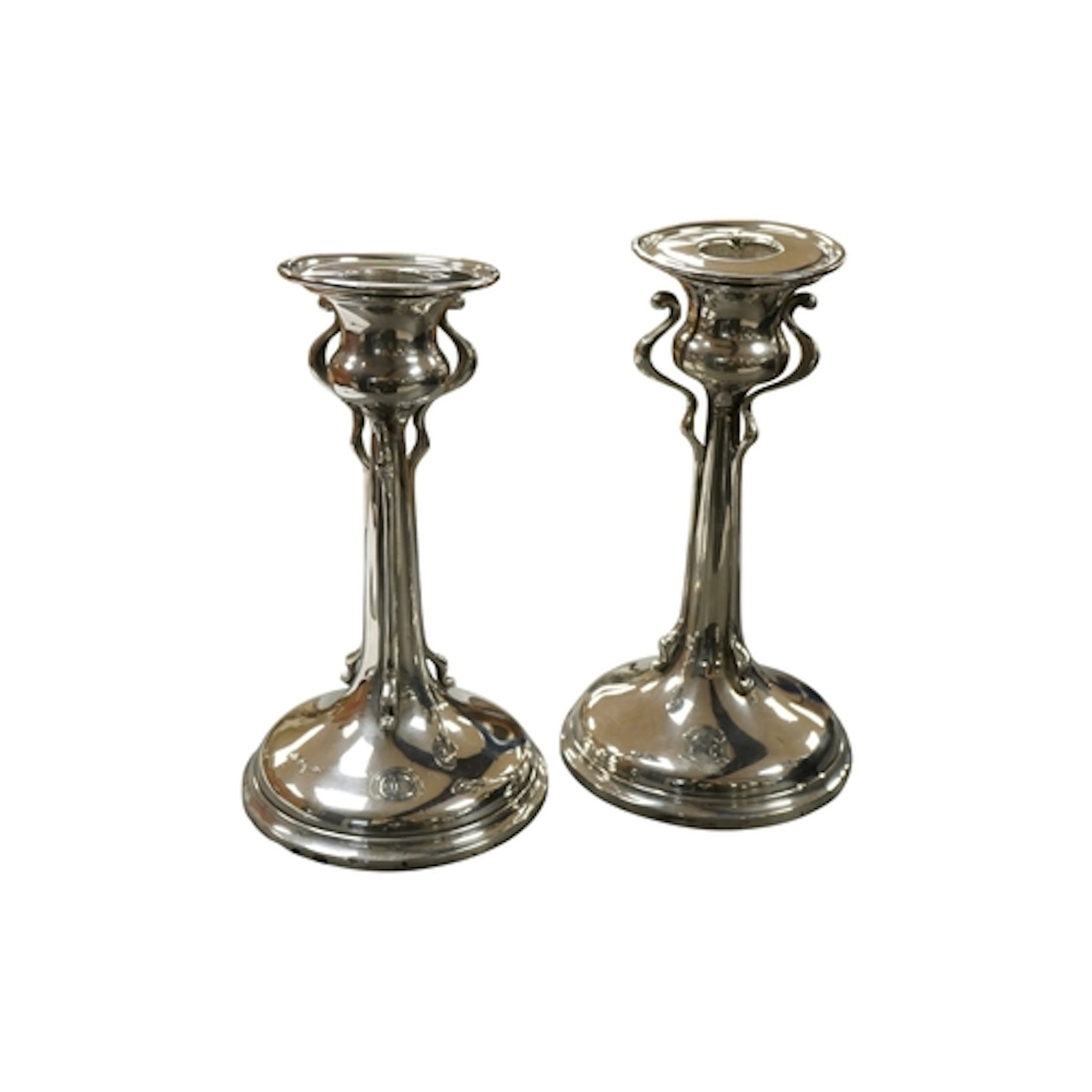 A pair of George V Arts & Crafts silver candlesticks, by Wal...