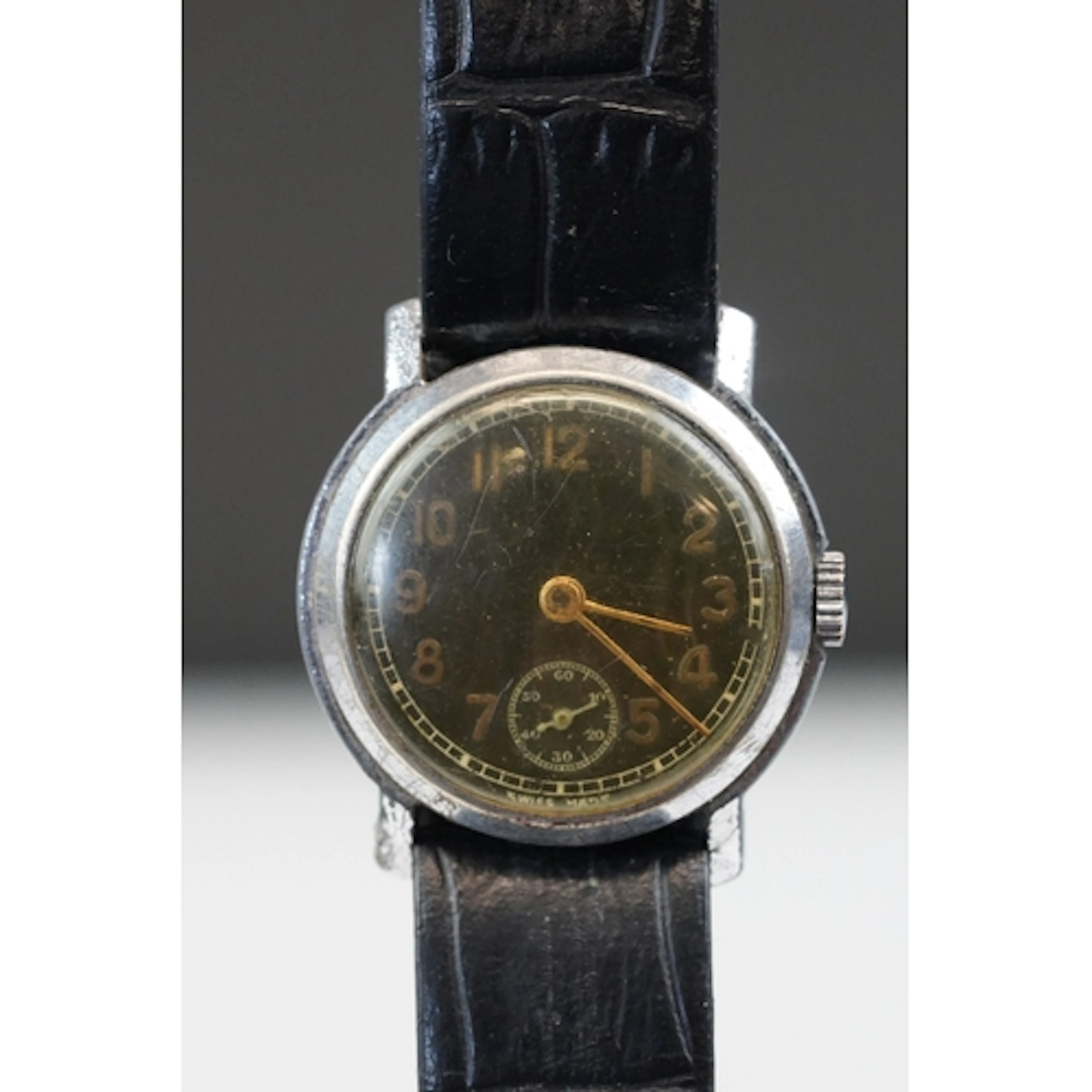 Mid 20th century Swiss wristwatch, with black dial and Arabi...