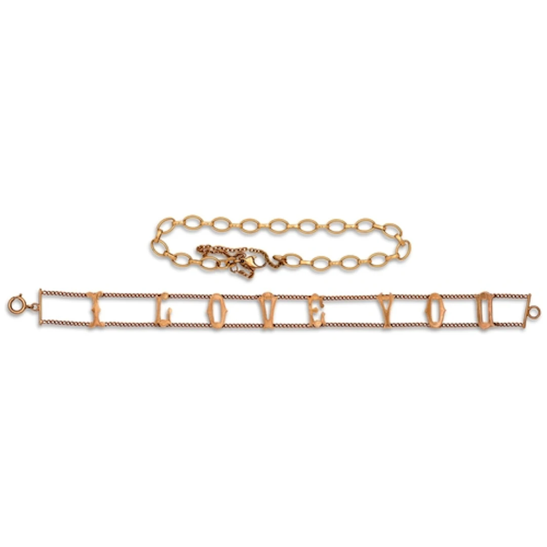 A gold bracelet, 18cm l, marked 750, 7g and an earlier gold ...