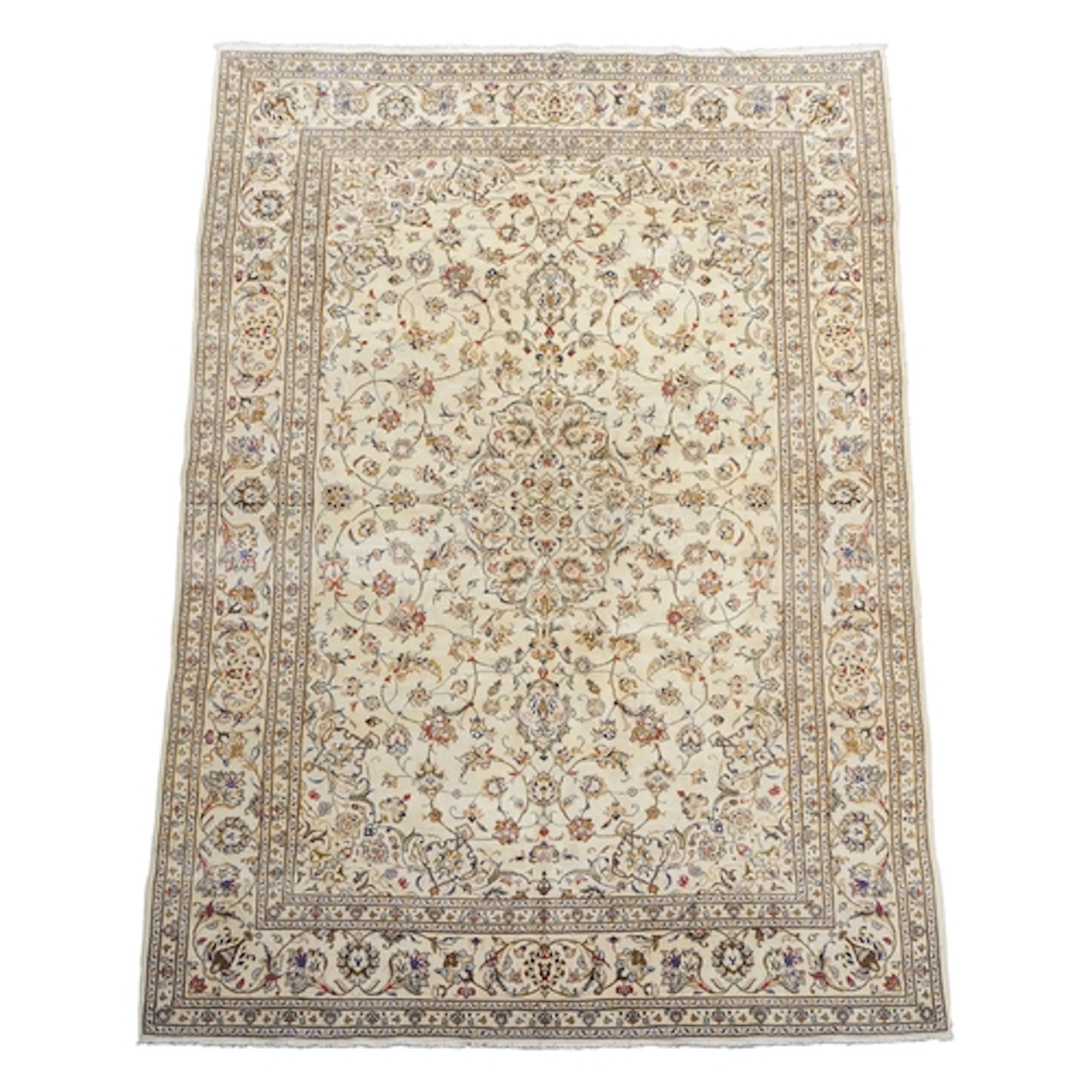 A Kashan ivory ground carpet, woven central lobed floral med...