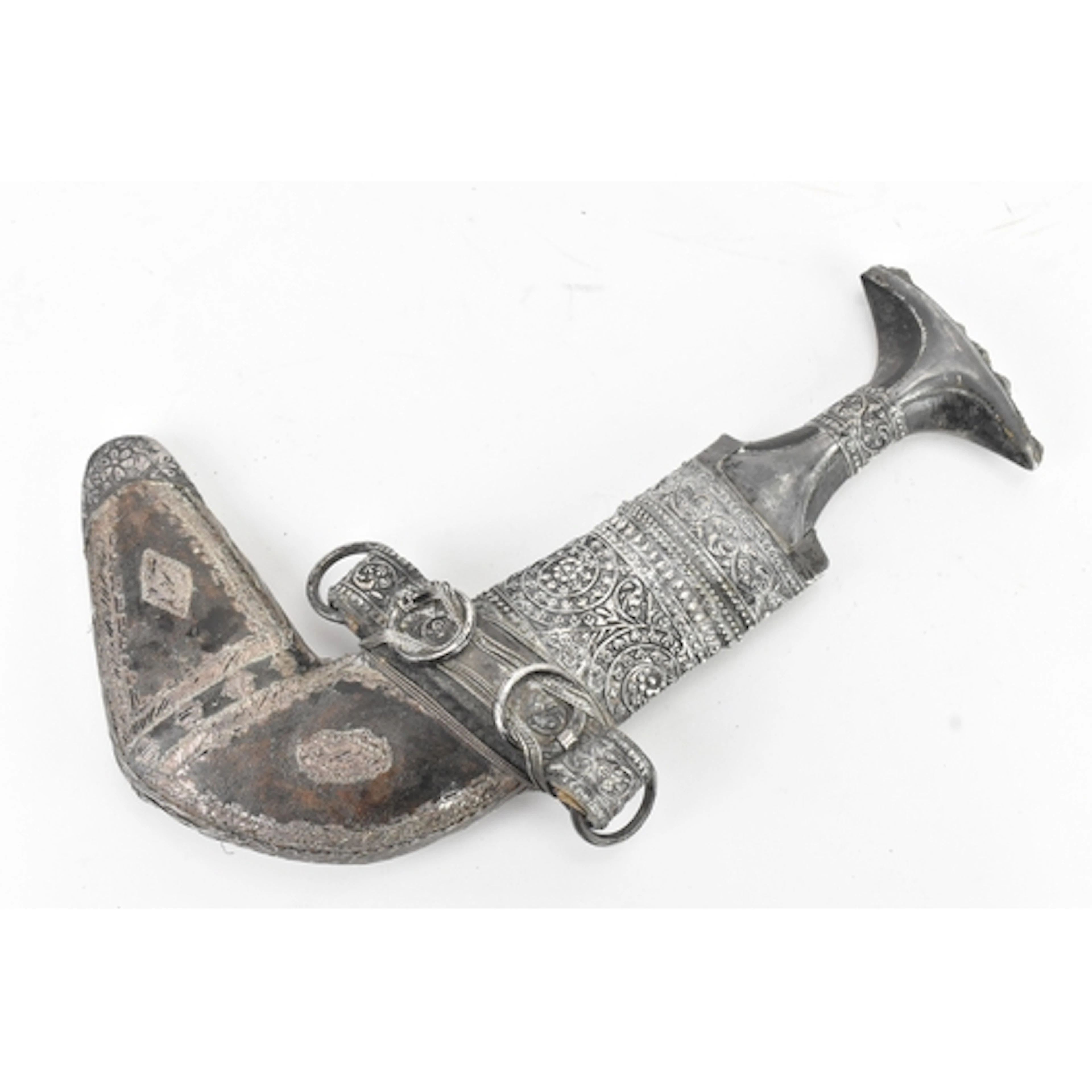 A late 19th century Omani white metal mounted khanjar, with ...