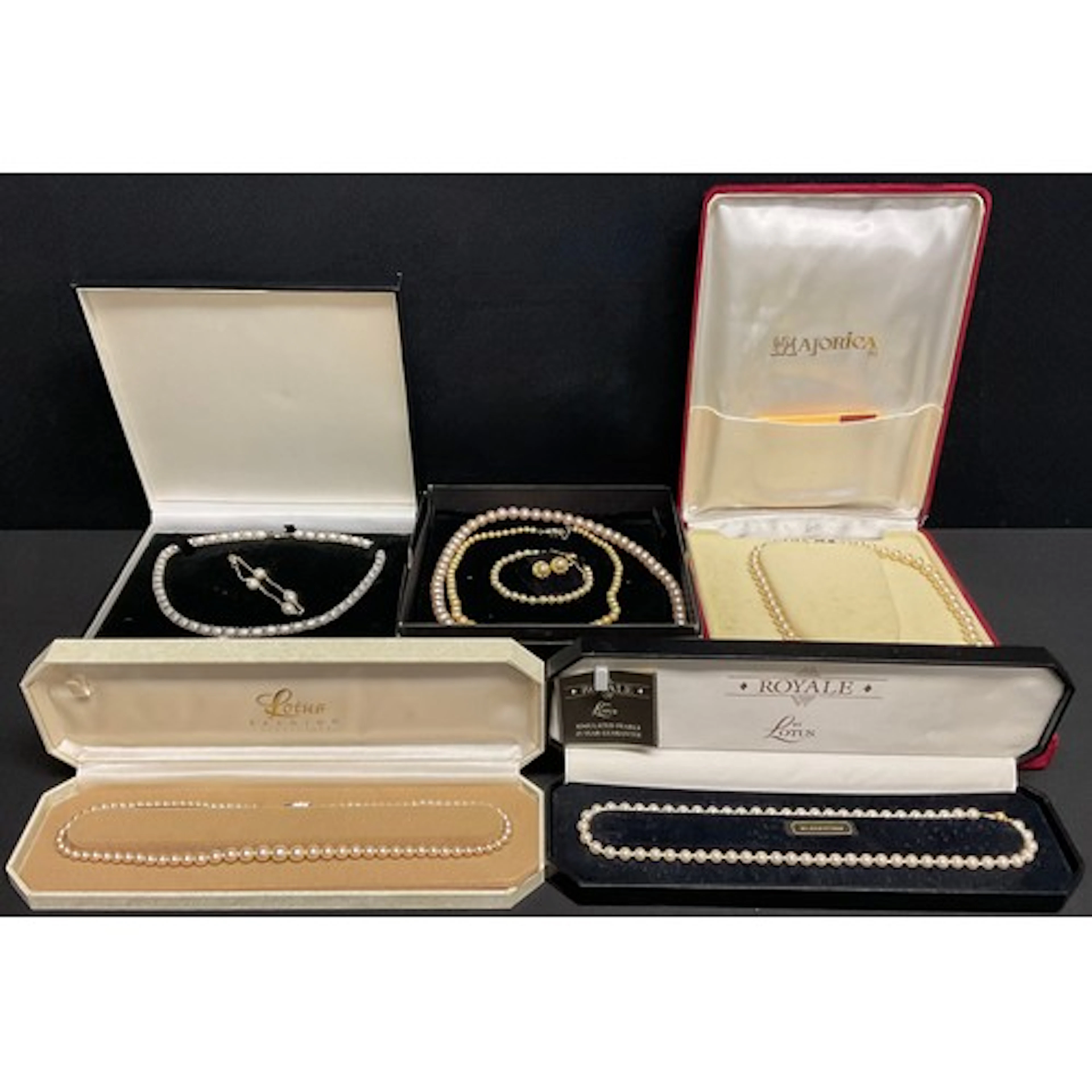 A selection of cultured pearl and simulated pearl jewellery;...