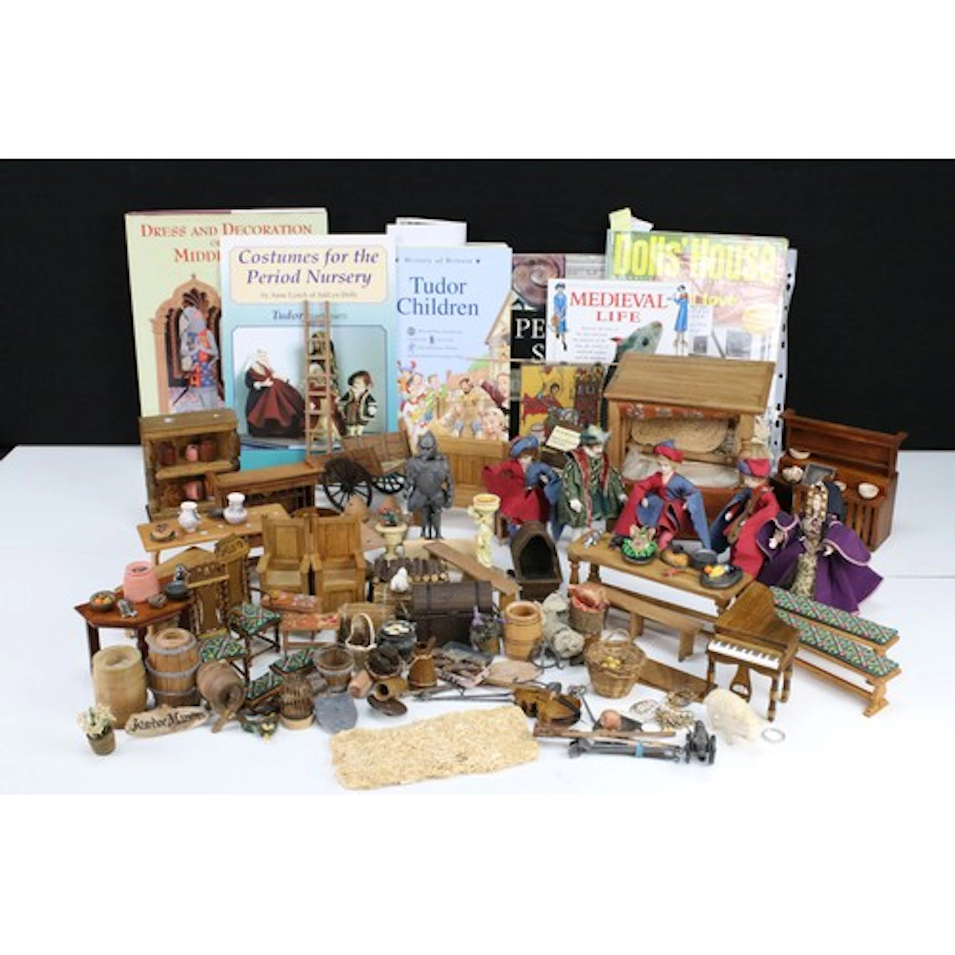 Collection of Tudor style dolls house furniture and accessor...