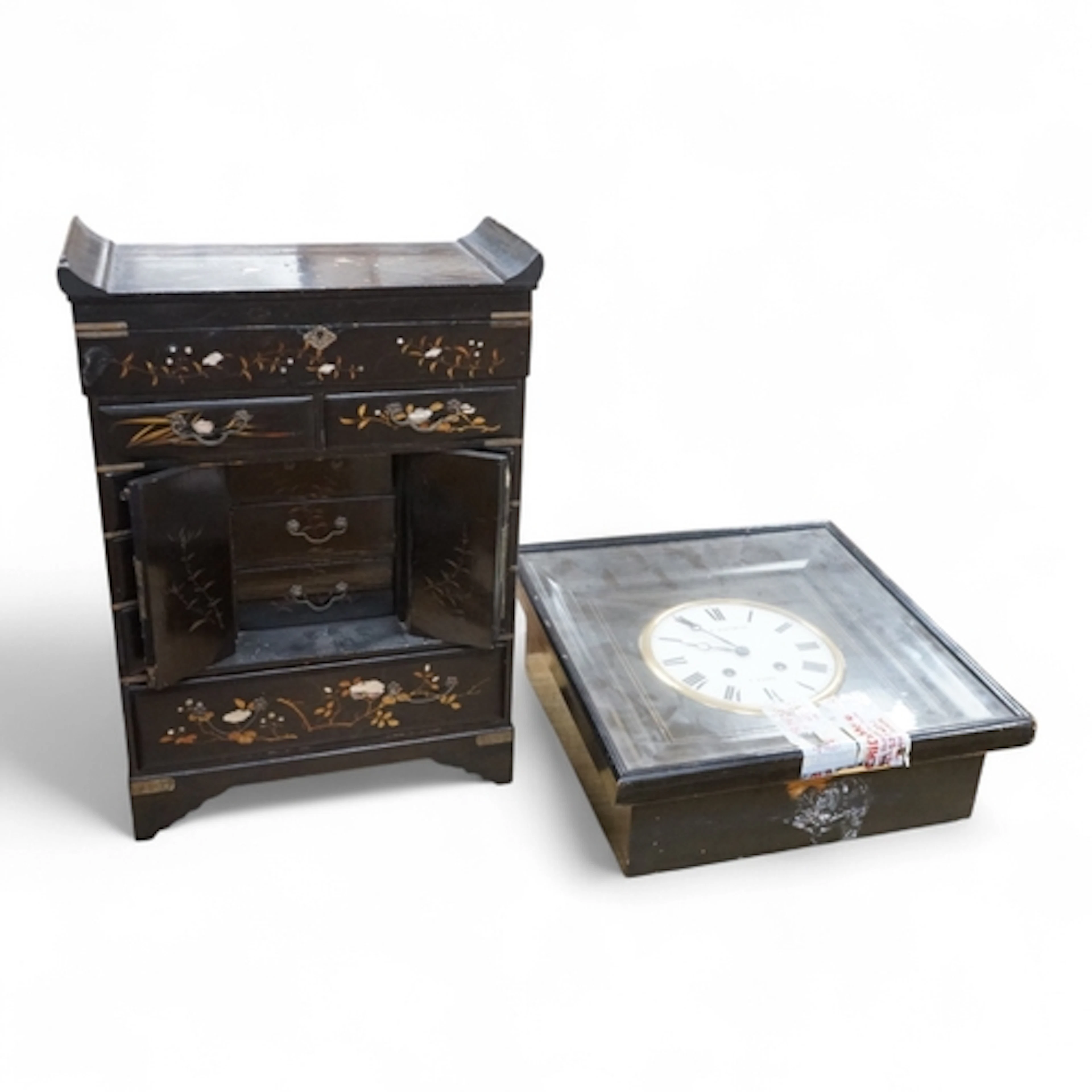 A Japanese lacquer table cabinet with inset porcelain panels...
