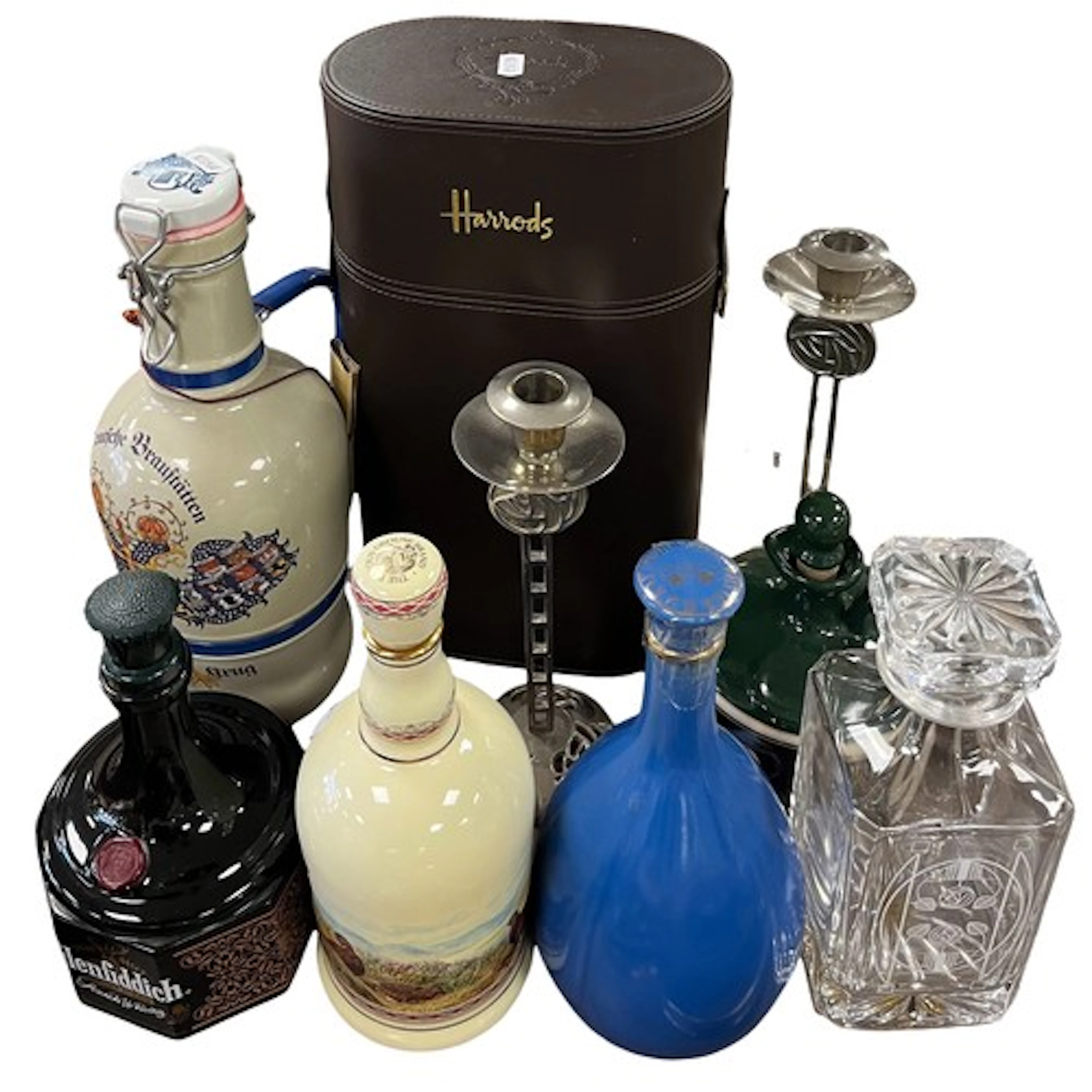 Collection of whiskey decanters to include The Famous Goose,...