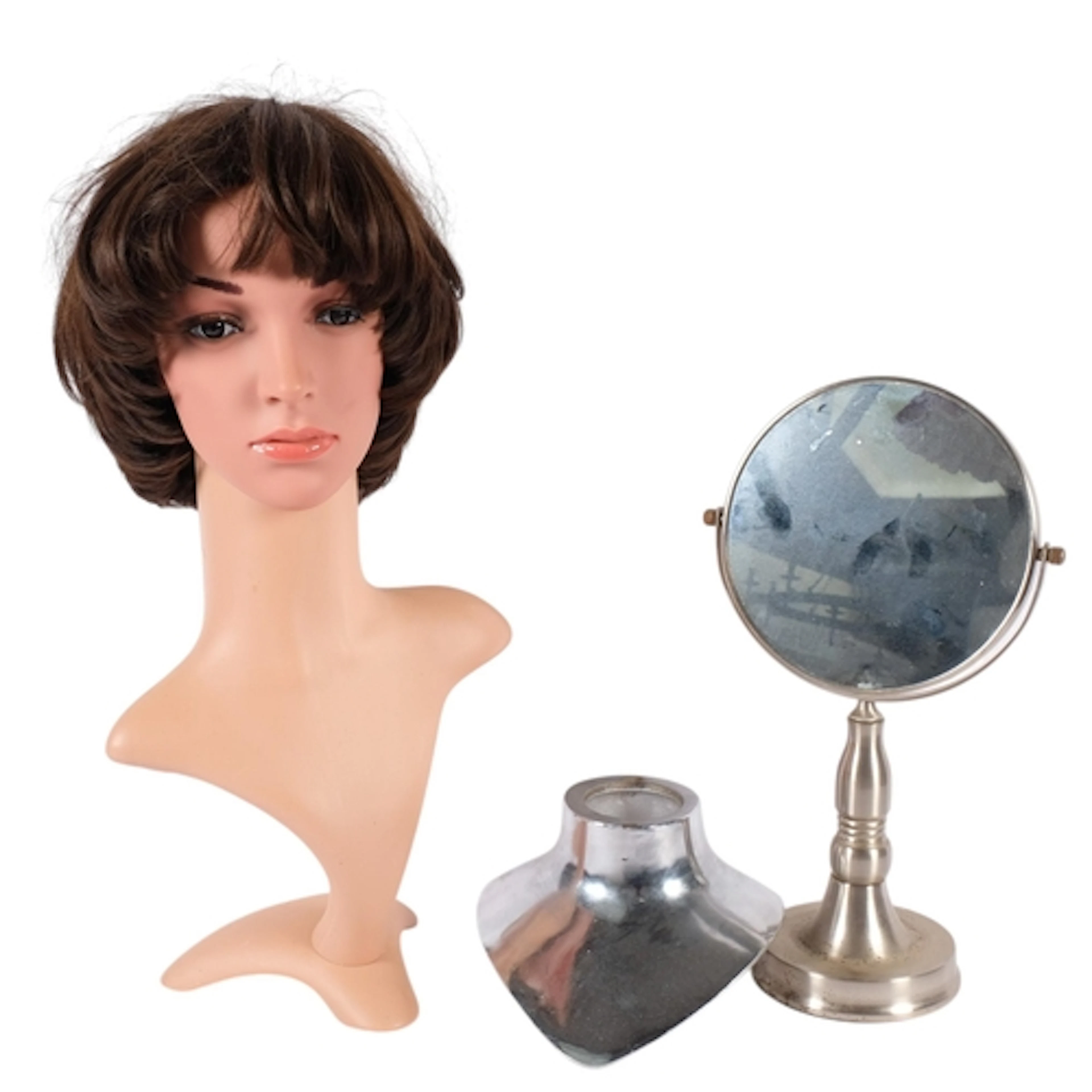 A Vintage plastic shop head and shoulder mannikin, with wig,...