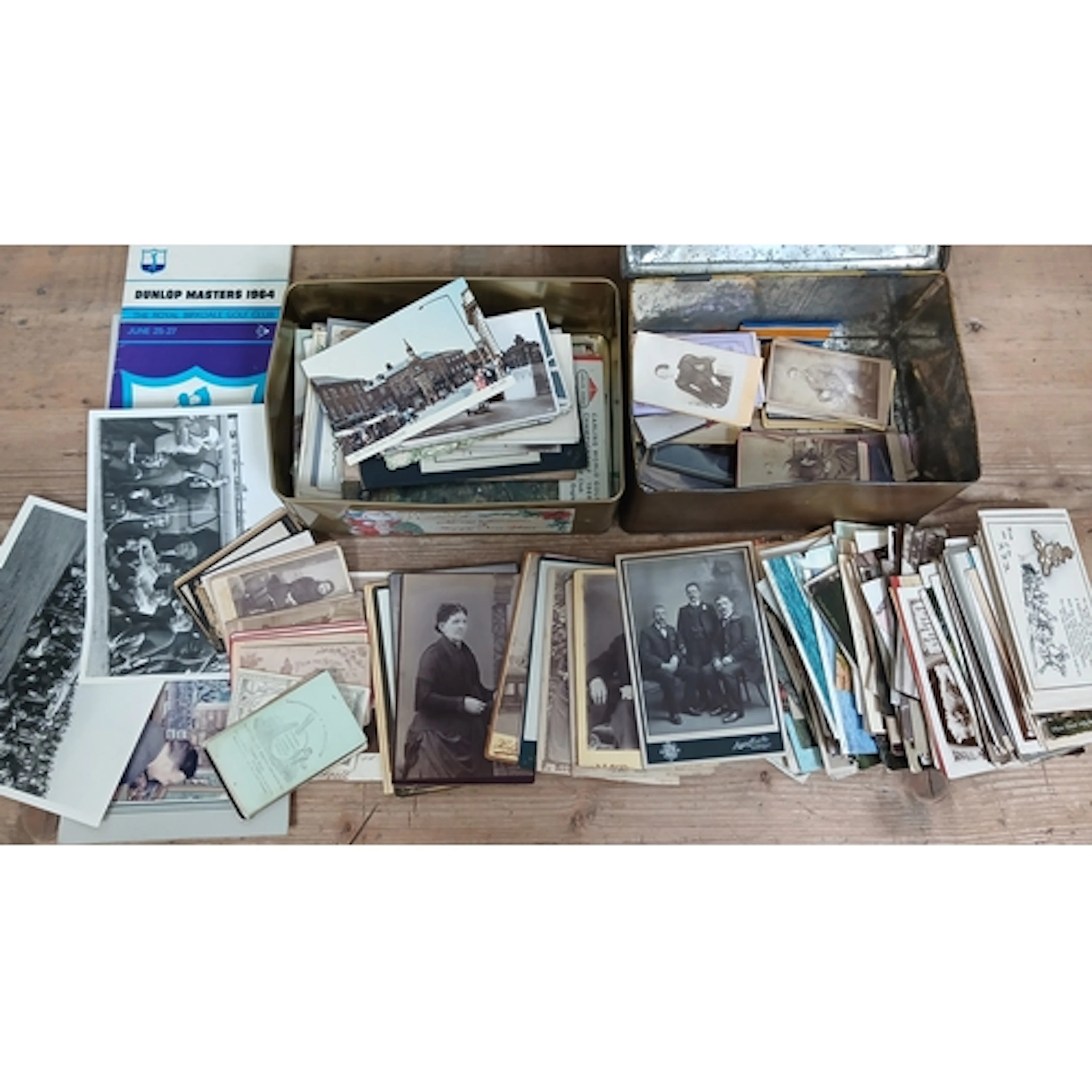 Two tins of assorted postcards and CDV cards, also including...