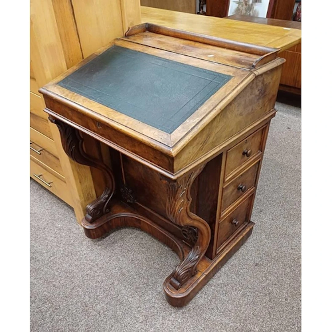 19TH CENTURY WALNUT DAVENPORT, THE LEATHER INSET WRITING SLO...