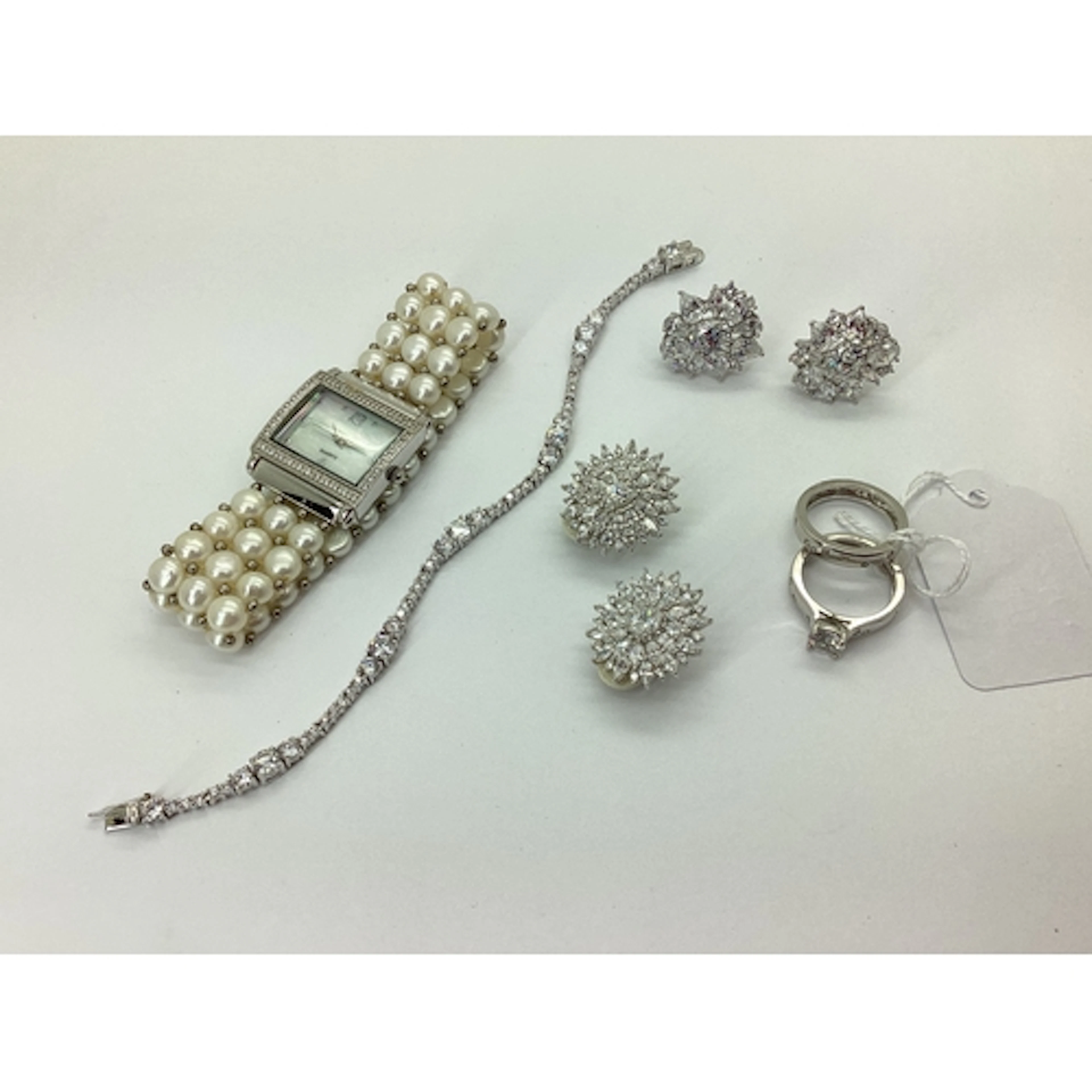 Diamonique; A Pair of Statement Clip-On Earrings, claw set t...