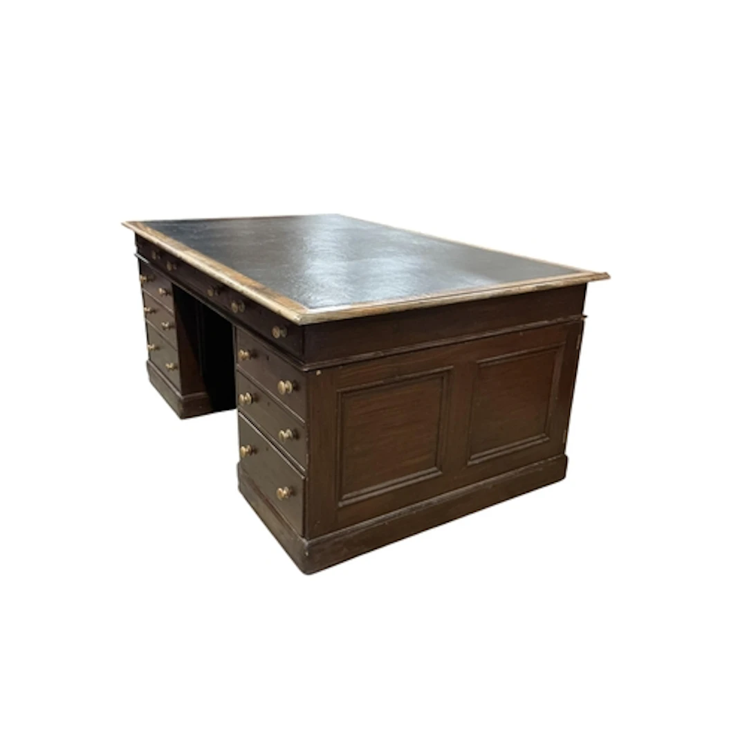 A Victorian pedestal partner's desk with mahogany-veneered t...