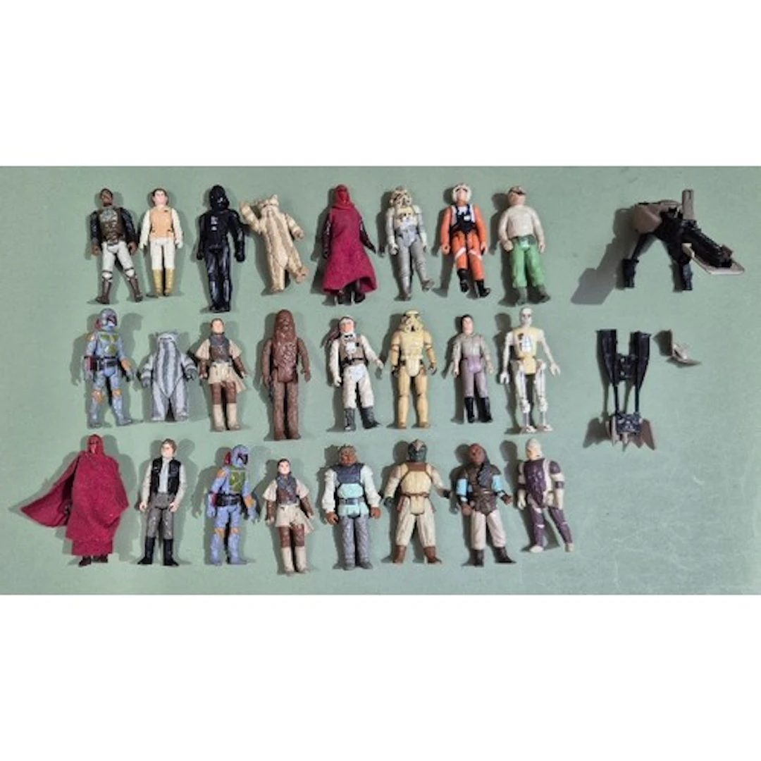 A group of 24 assorted original Star Wars figures & a speede...