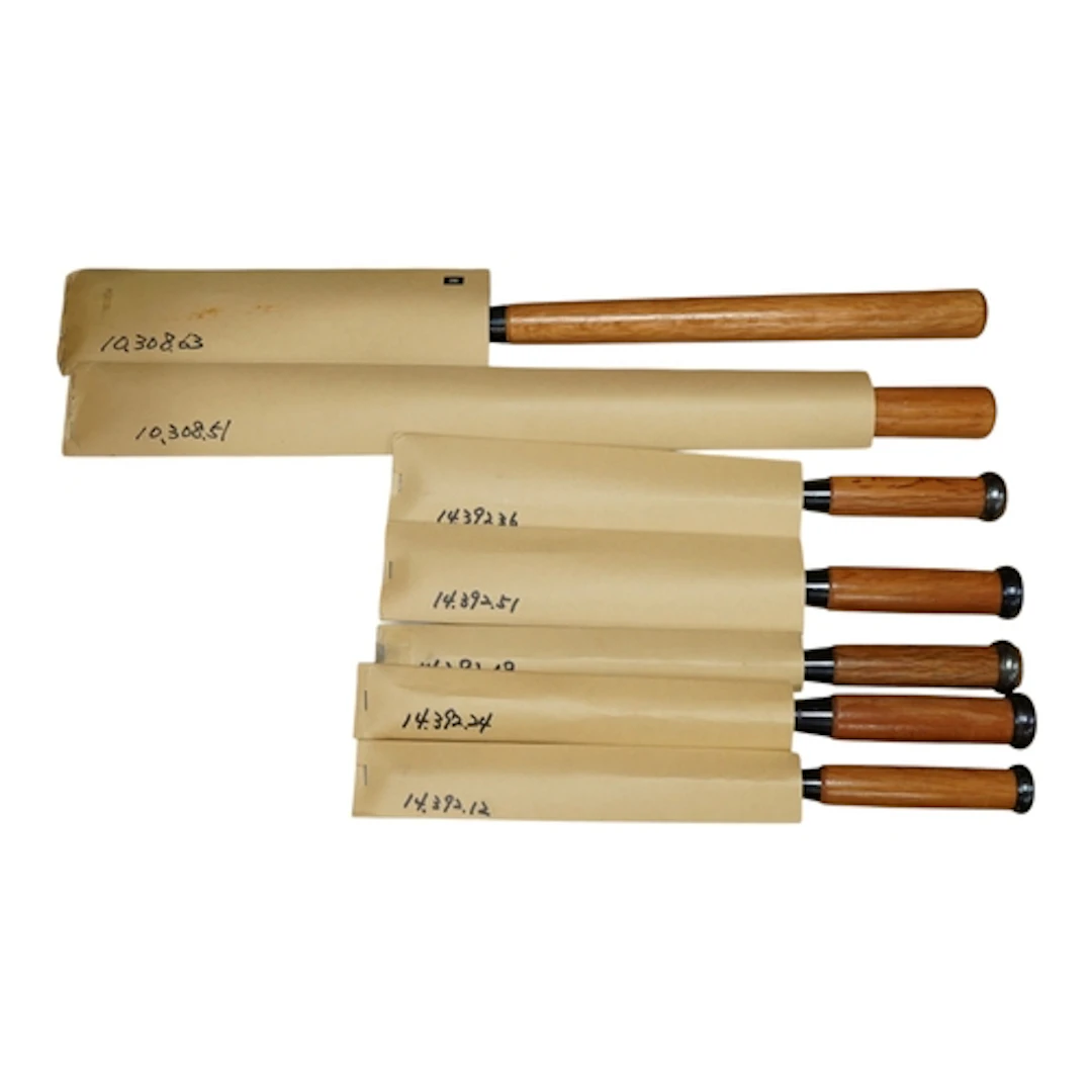 Seven large Japanese wood framer's bevel edge chisels, large...