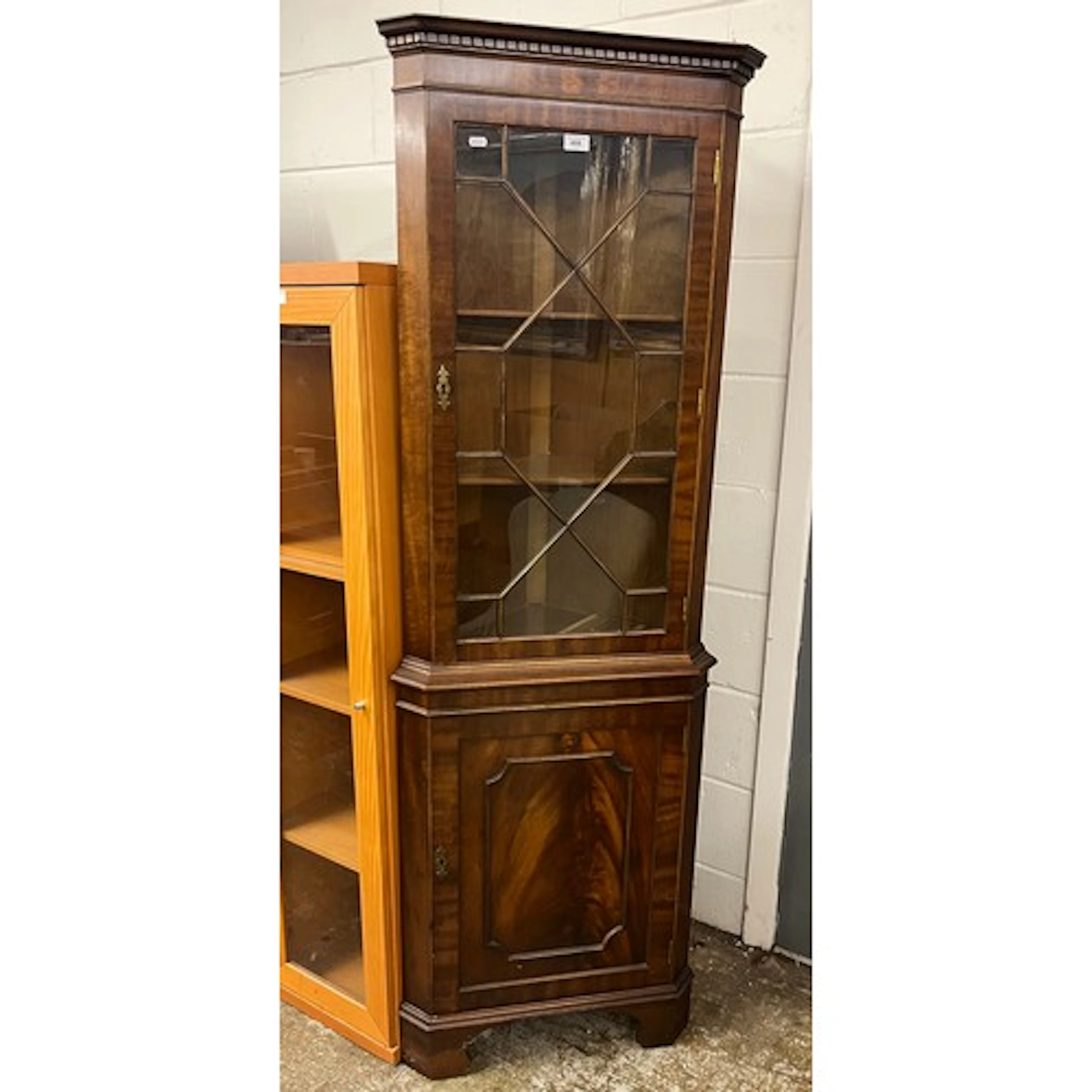 Reproduction mahogany corner cabinet, upper section enclosed...
