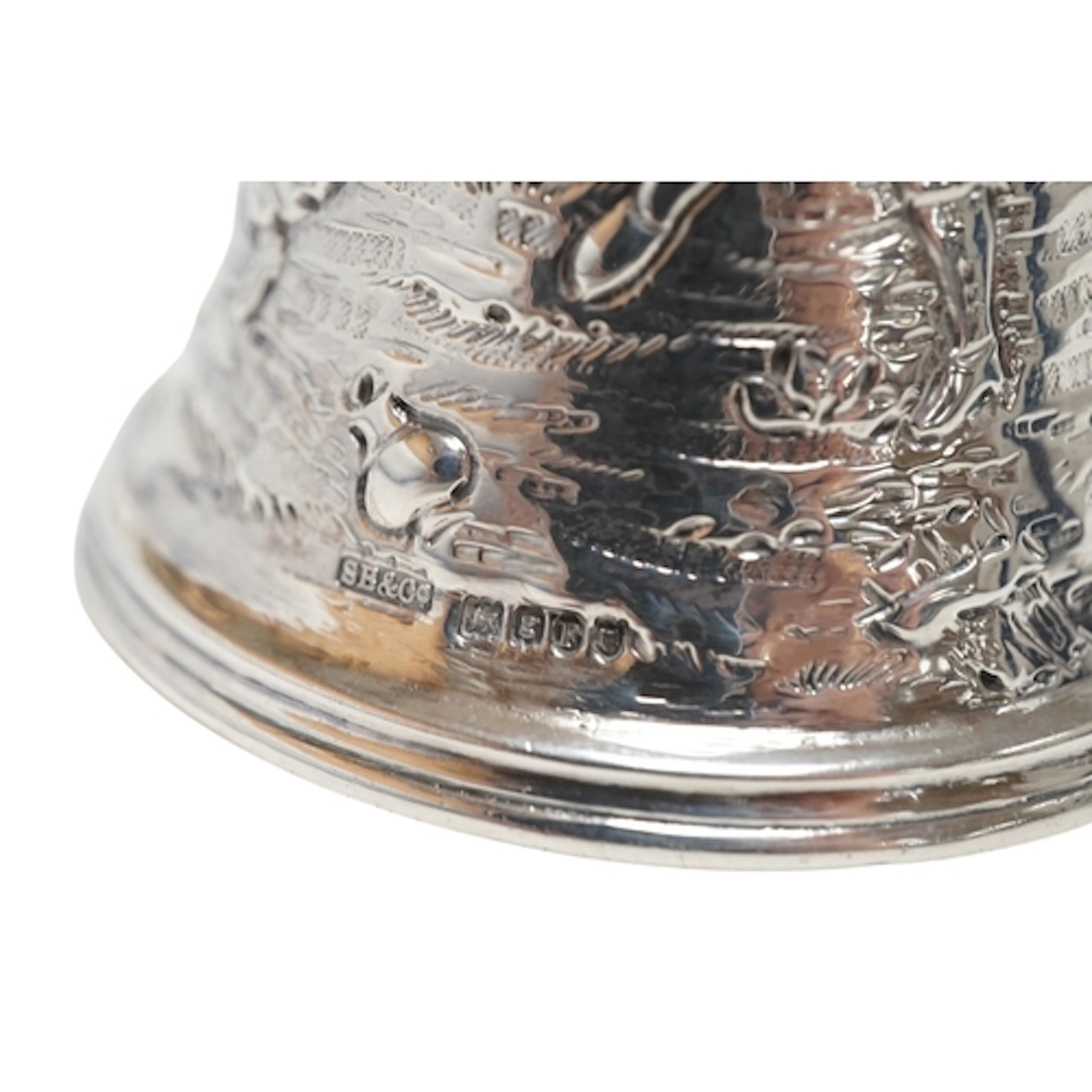 An Edwardian continental silver hand bell with figural handl...
